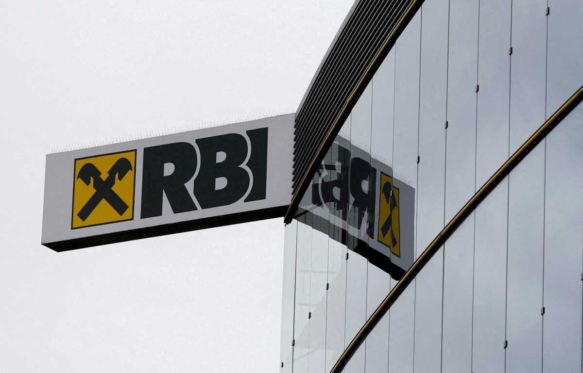 FILE PHOTO: The logo of Raiffeisen Bank International (RBI) is pictured on its headquarters in Vienna, Austria March 13, 2019.   REUTERS