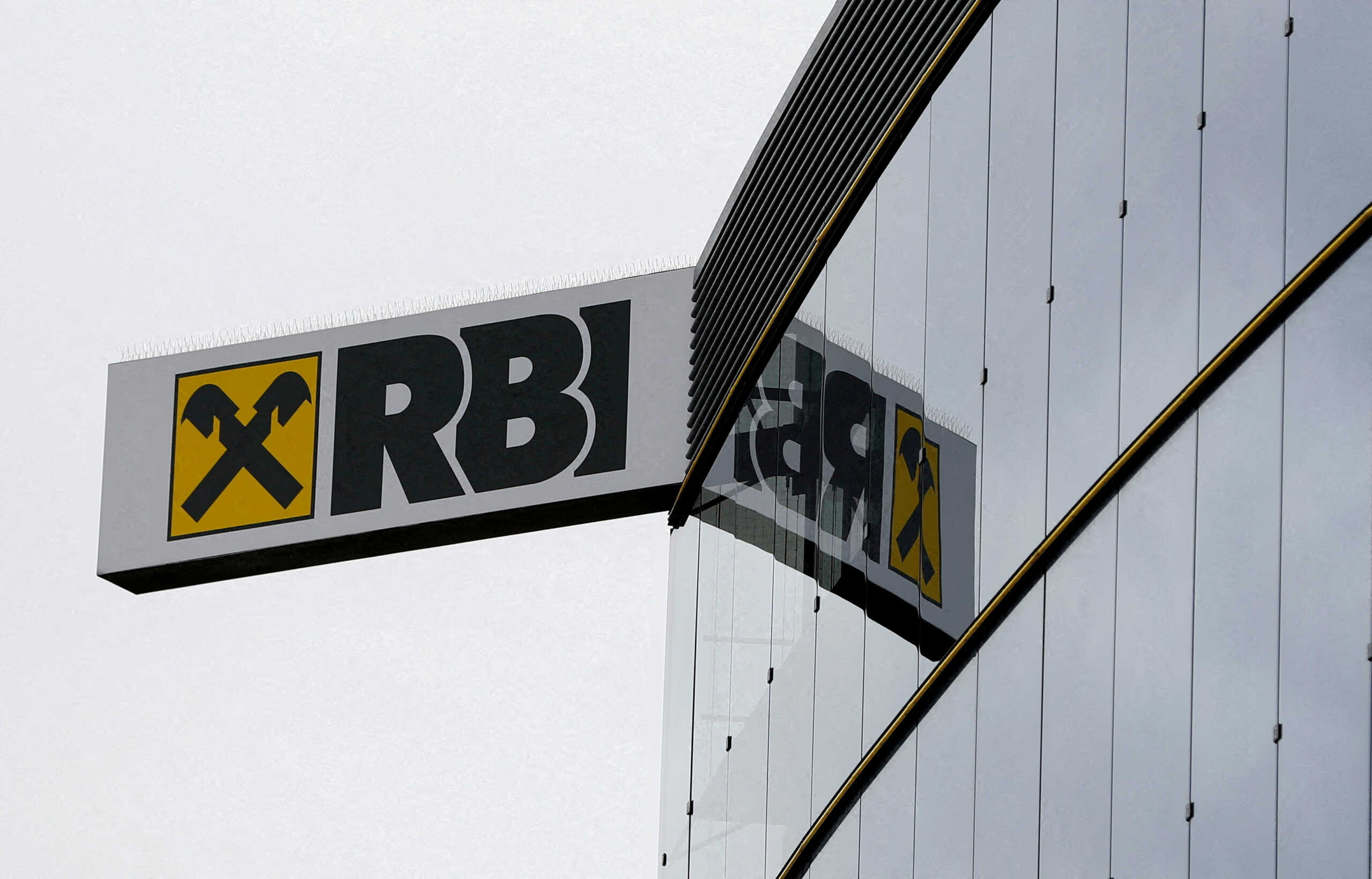 FILE PHOTO: The logo of Raiffeisen Bank International (RBI) is pictured on its headquarters in Vienna, Austria March 13, 2019.   REUTERS