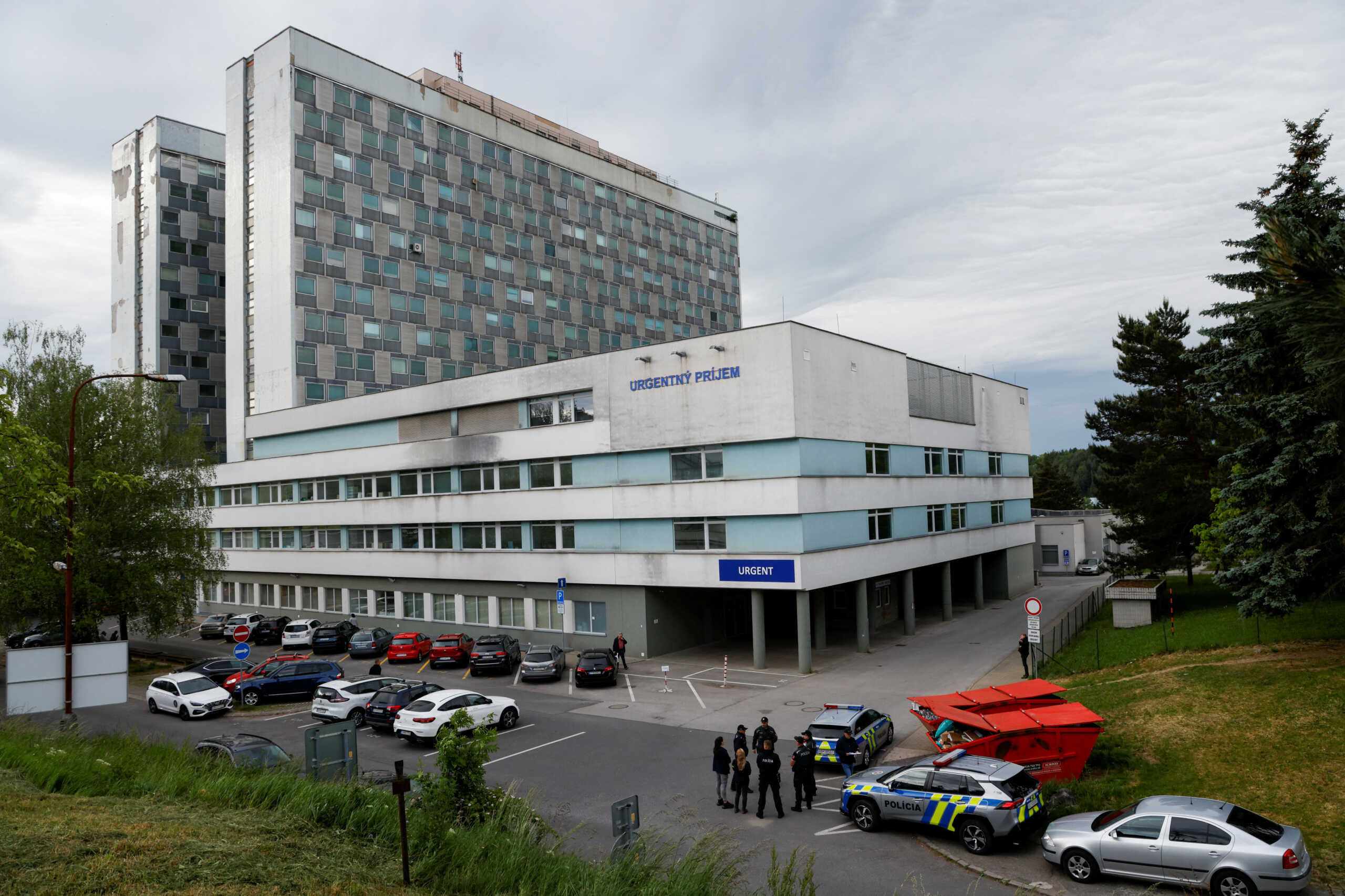 Police officers stand next to police vehicles outside the F.D. Roosevelt University Hospital where Slovak Prime Minister Robert Fico was taken after a shooting incident in Handlova, in Banska Bystrica, Slovakia, May 17, 2024. REUTERS