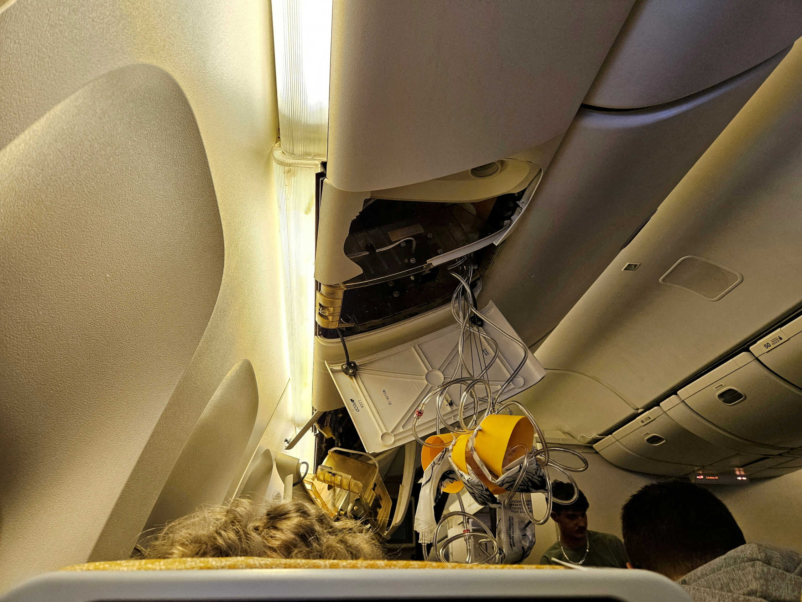 FILE PHOTO: FILE PHOTO: The interior of Singapore Airlines flight SQ321 is pictured after an emergency landing at Bangkok's Suvarnabhumi International Airport, in Bangkok, Thailand May 21, 2024 in this handout image. Handout via REUTERS
