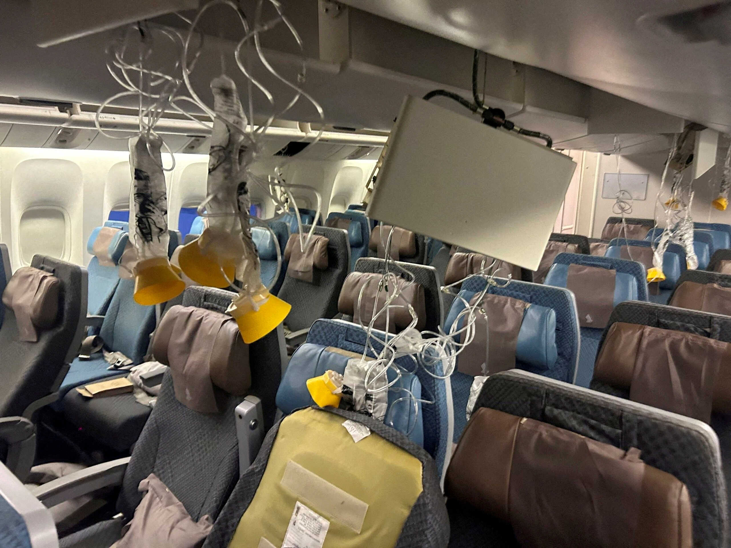FILE PHOTO: The interior of Singapore Airlines flight SQ321 is pictured after an emergency landing at Bangkok's Suvarnabhumi International Airport, Thailand, May 21, 2024. REUTERS