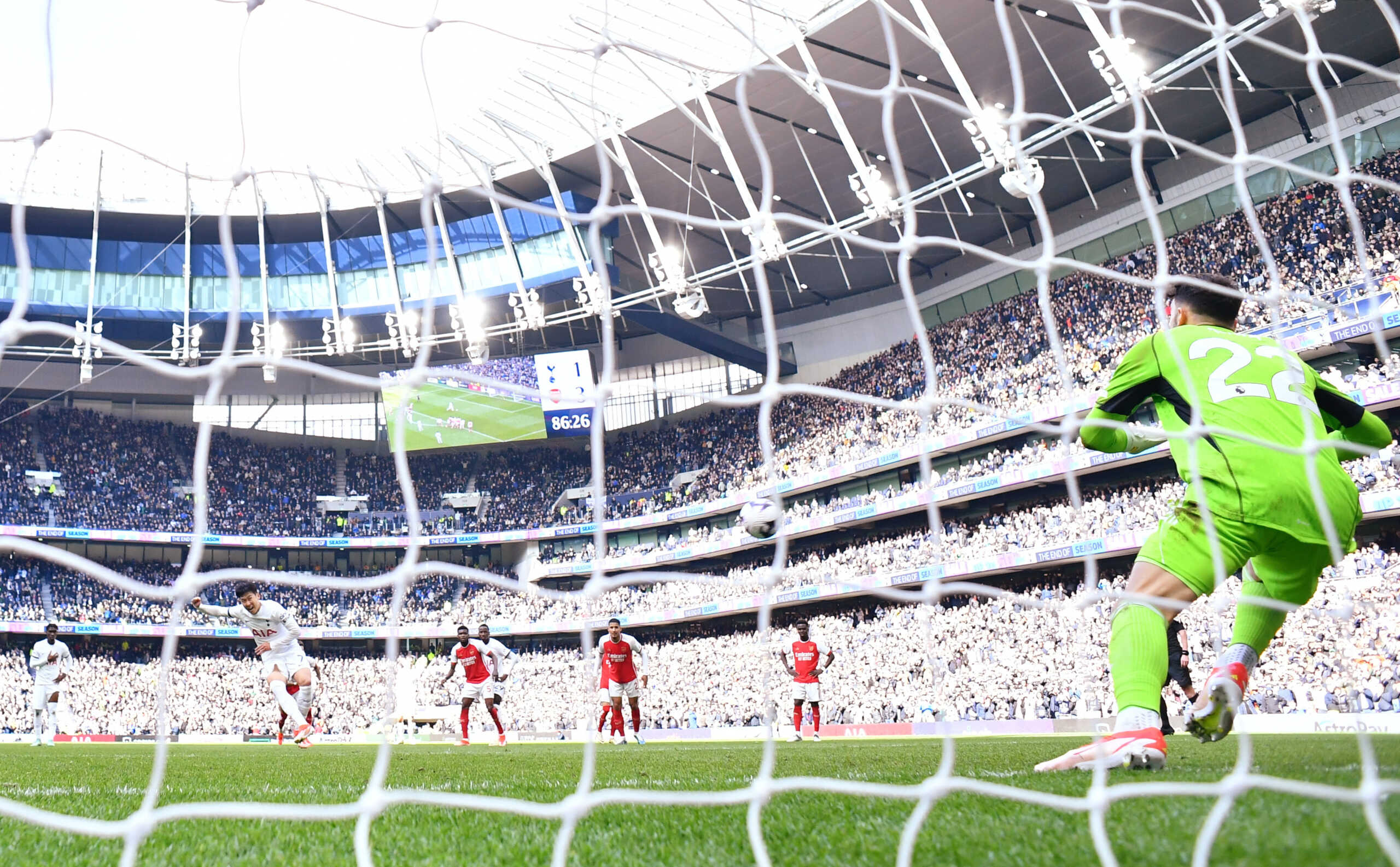 Soccer Football - Premier League - Tottenham Hotspur v Arsenal - Tottenham Hotspur Stadium, London, Britain - April 28, 2024 Tottenham Hotspur's Son Heung-min scores their second goal from the penalty spot past Arsenal's David Raya REUTERS