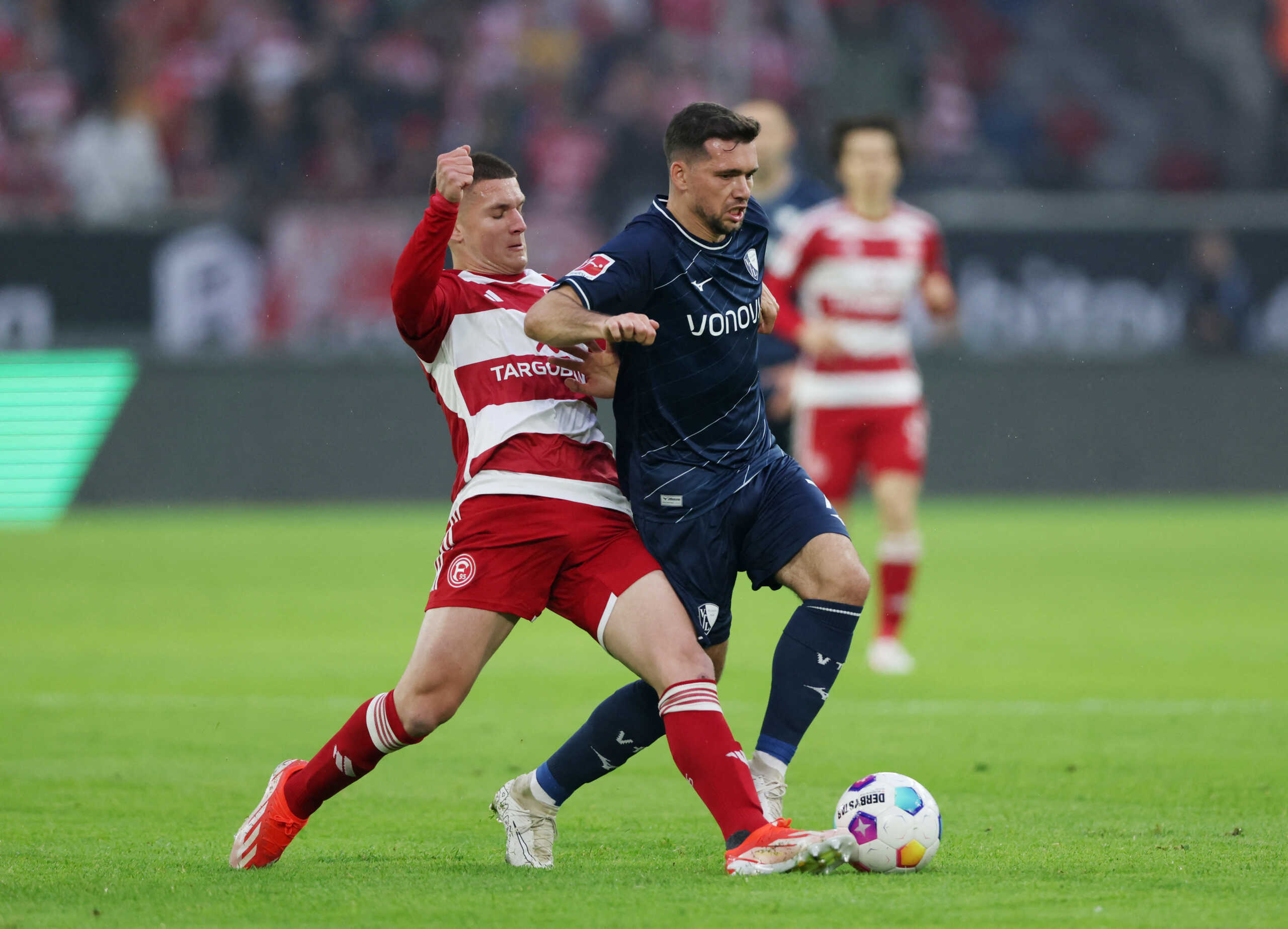 Soccer Football - Relegation Play-Offs - Final - Second Leg - Fortuna Dusseldorf v VfL Bochum - Merkur Spiel-Arena, Dusseldorf, Germany -  May 27, 2024 Fortuna Dusseldorf's Christos Tzolis in action with VfL Bochum's Kevin Stoger REUTERS