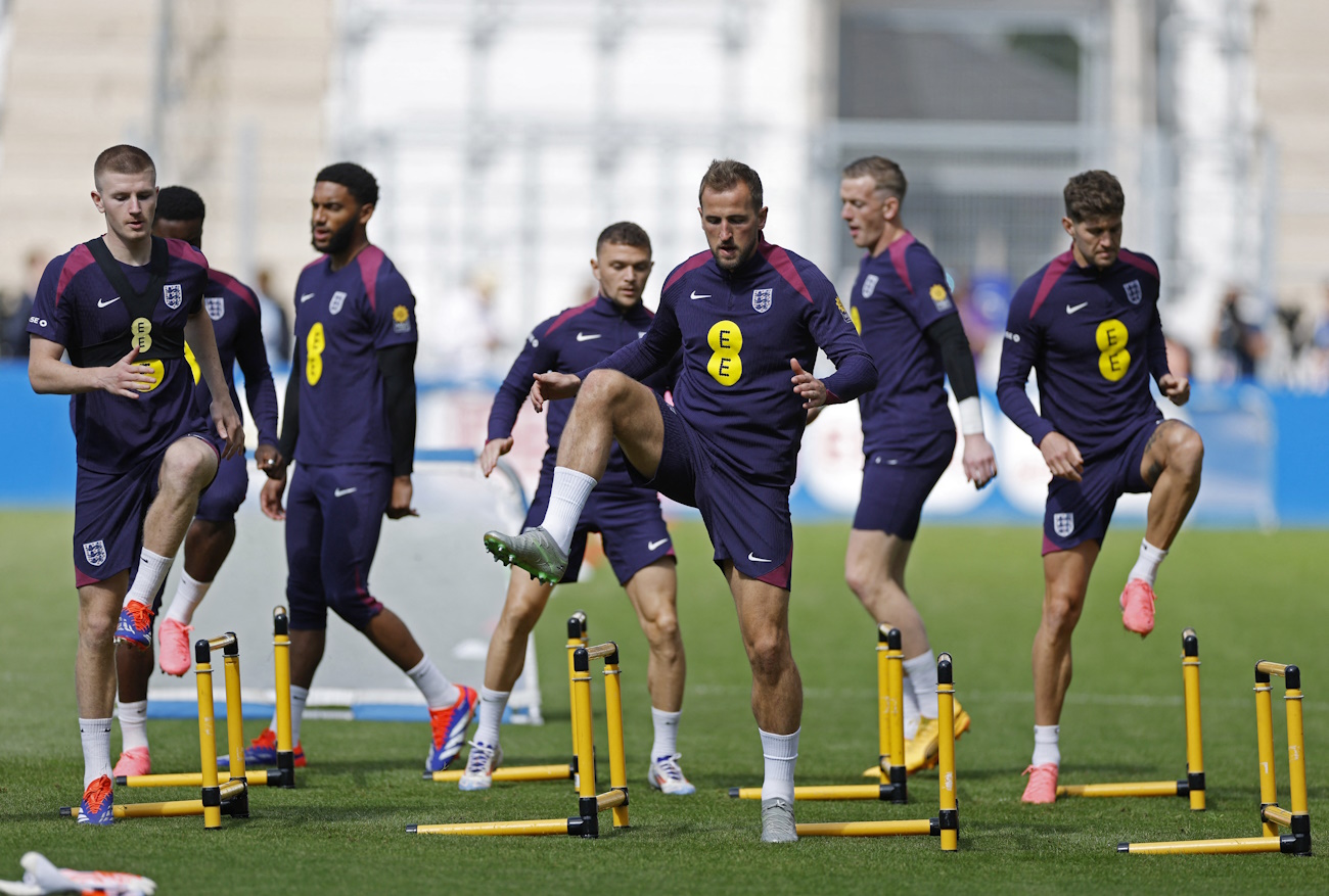 Soccer Football - Euro 2024 - England Training - Jena Stadion, Ernst-Abbe-Sportfeld, Jena, Germany - June 11, 2024 England's Harry Kane with Adam Wharton and teammates during training REUTERS
