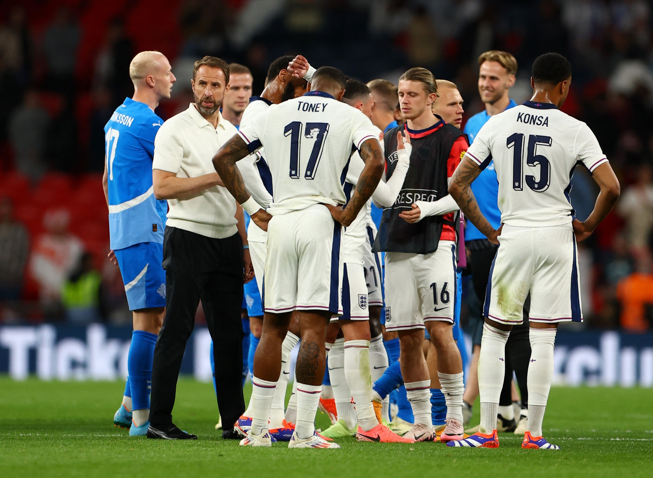 Soccer Football - International Friendly - England v Iceland - Wembley Stadium, London, Britain - June 7, 2024 England manager Gareth Southgate with players look dejected after the match REUTERS