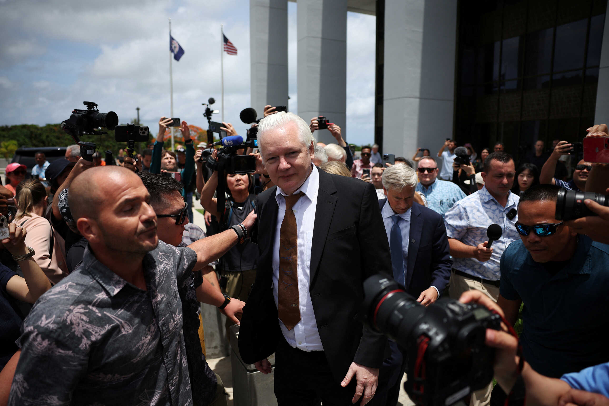 WikiLeaks founder Julian Assange makes his way as he leaves the United States District Court following a hearing, in Saipan, Northern Mariana Islands, U.S., June 26, 2024. REUTERS