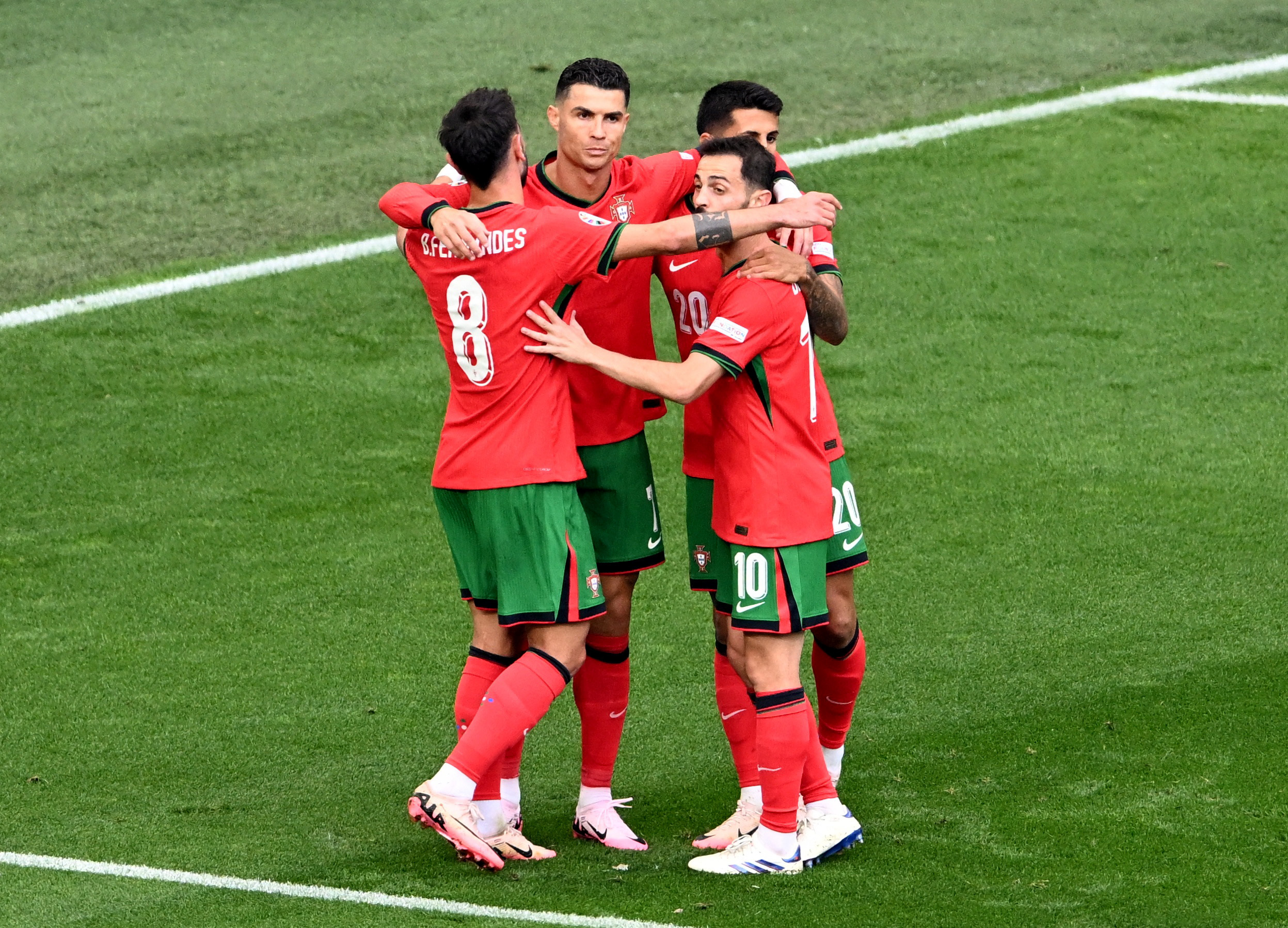 Soccer Football - Euro 2024 - Group F - Turkey v Portugal - Dortmund BVB Stadion, Dortmund, Germany - June 22, 2024 Portugal's Bruno Fernandes celebrates scoring their third goal with Cristiano Ronaldo, Bernardo Silva and Joao Cancelo REUTERS