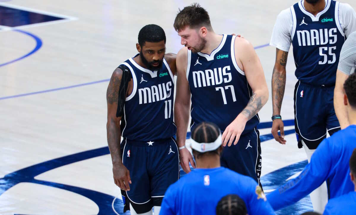 Jun 14, 2024; Dallas, Texas, USA; Dallas Mavericks guard Kyrie Irving (11) reacts with Dallas Mavericks guard Luka Doncic (77) during the second half against the Boston Celtics during game four of the 2024 NBA Finals at American Airlines Center. Mandatory Credit: Kevin Jairaj-USA TODAY Sports