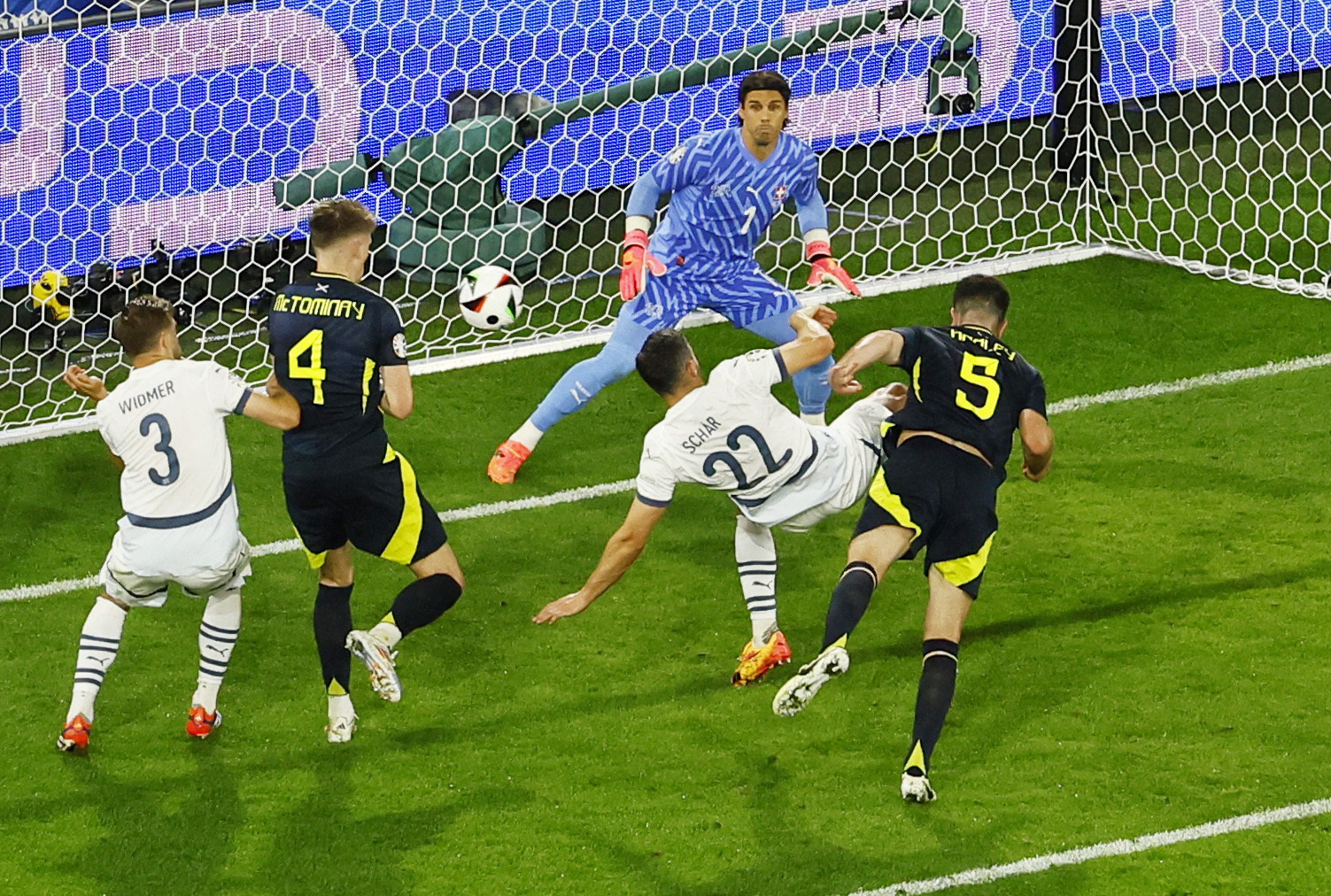 Soccer Football - Euro 2024 - Group A - Scotland v Switzerland - Cologne Stadium, Cologne, Germany - June 19, 2024 Scotland's Grant Hanley heads at goal and hits the post REUTERS