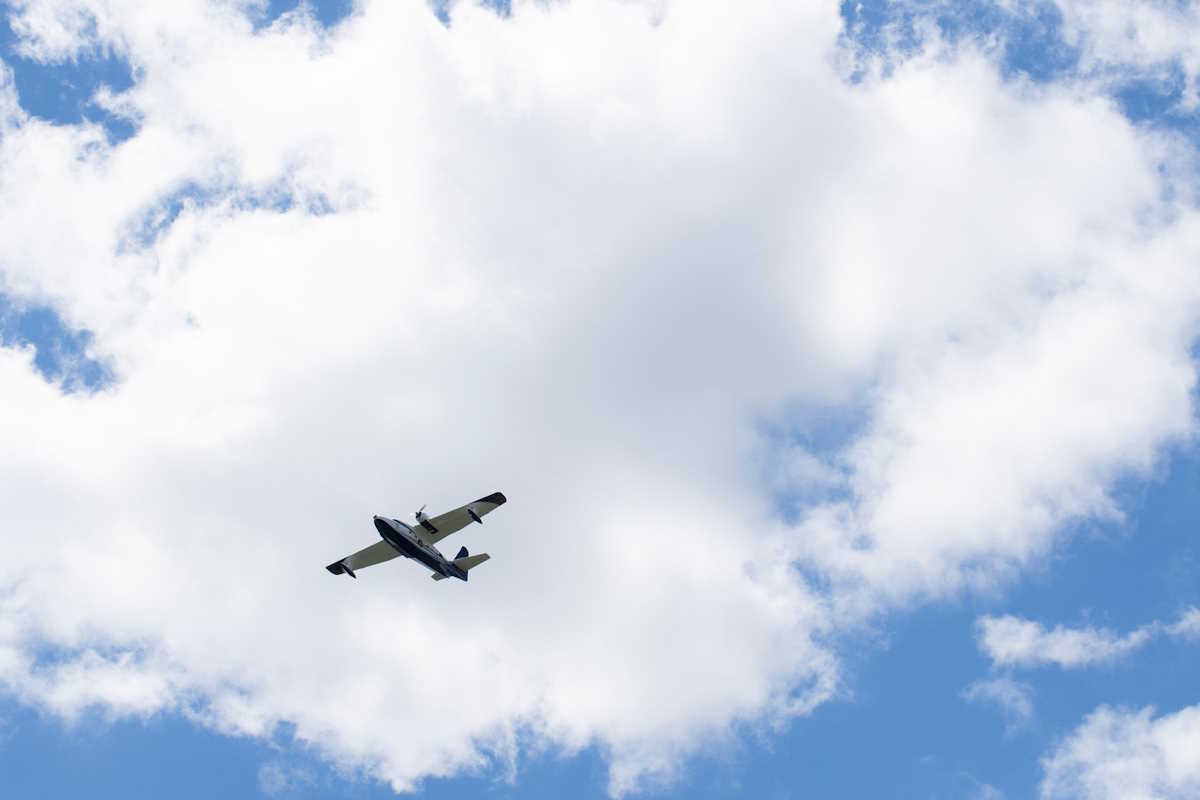 A small plane flies over the National Mall during an Aircraft Owners and Pilots Association (AOPA) 85th anniversary event in Washington, U.S., May 11, 2024. REUTERS