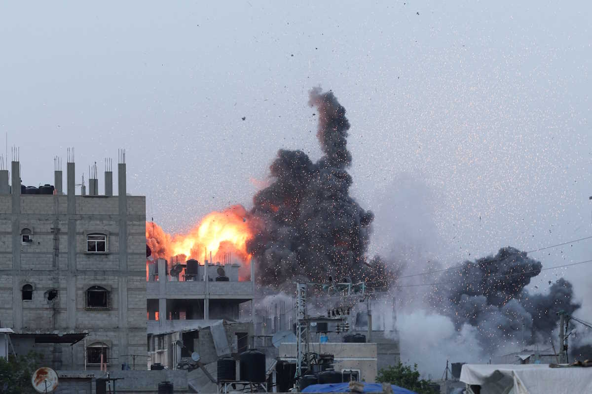Smoke and flames rise during an Israeli air strike in central Gaza Strip, June 3, 2024. REUTERS