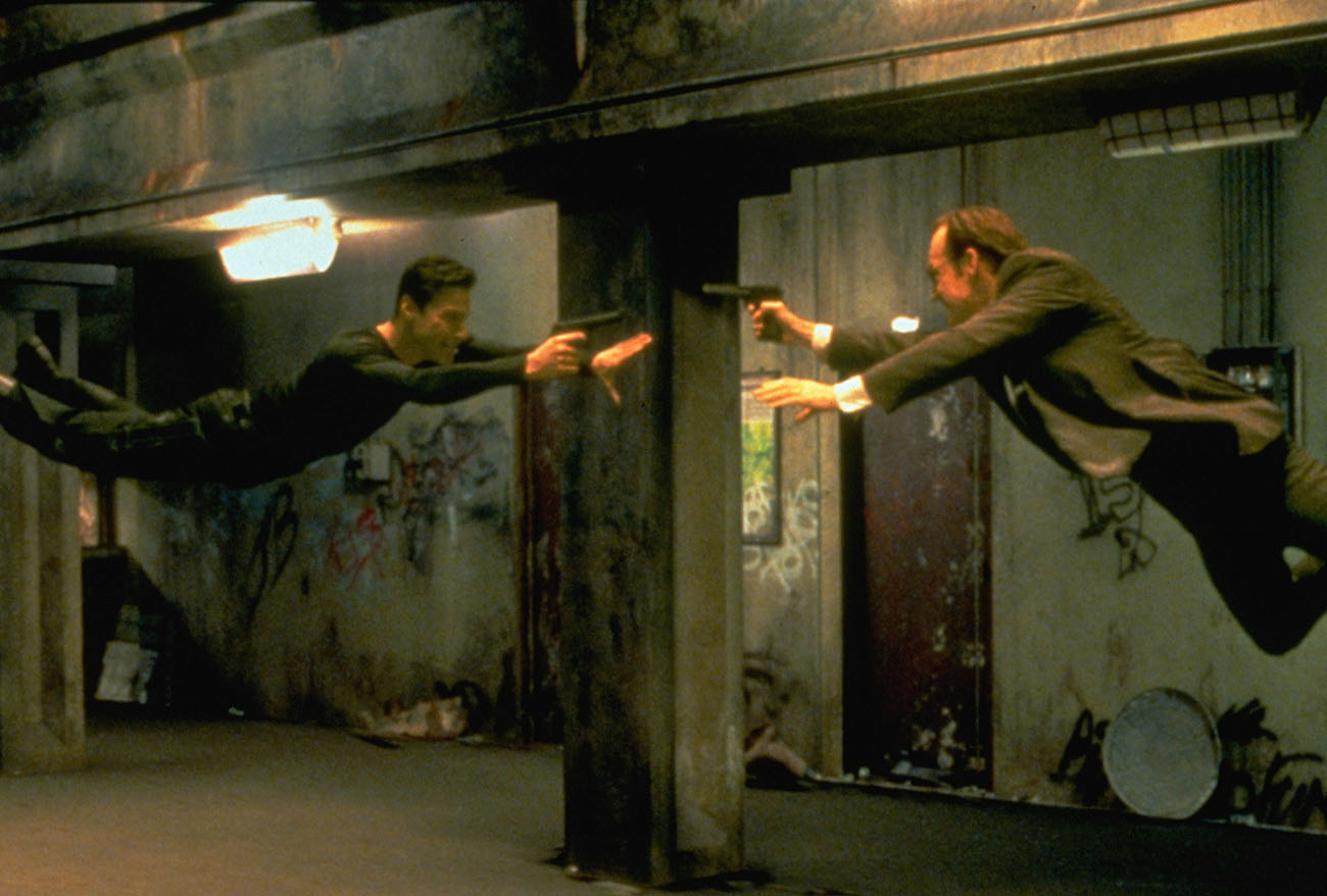 Keanu Reeves and Hugo Weaving face each other in a scene from Andy and Larry Wachowski's 1999 movie The Matrix. In this scene, Neo (Reeves) fights the computerized Agent Smith (Weaving). (Photo by Ronald Siemoneit
