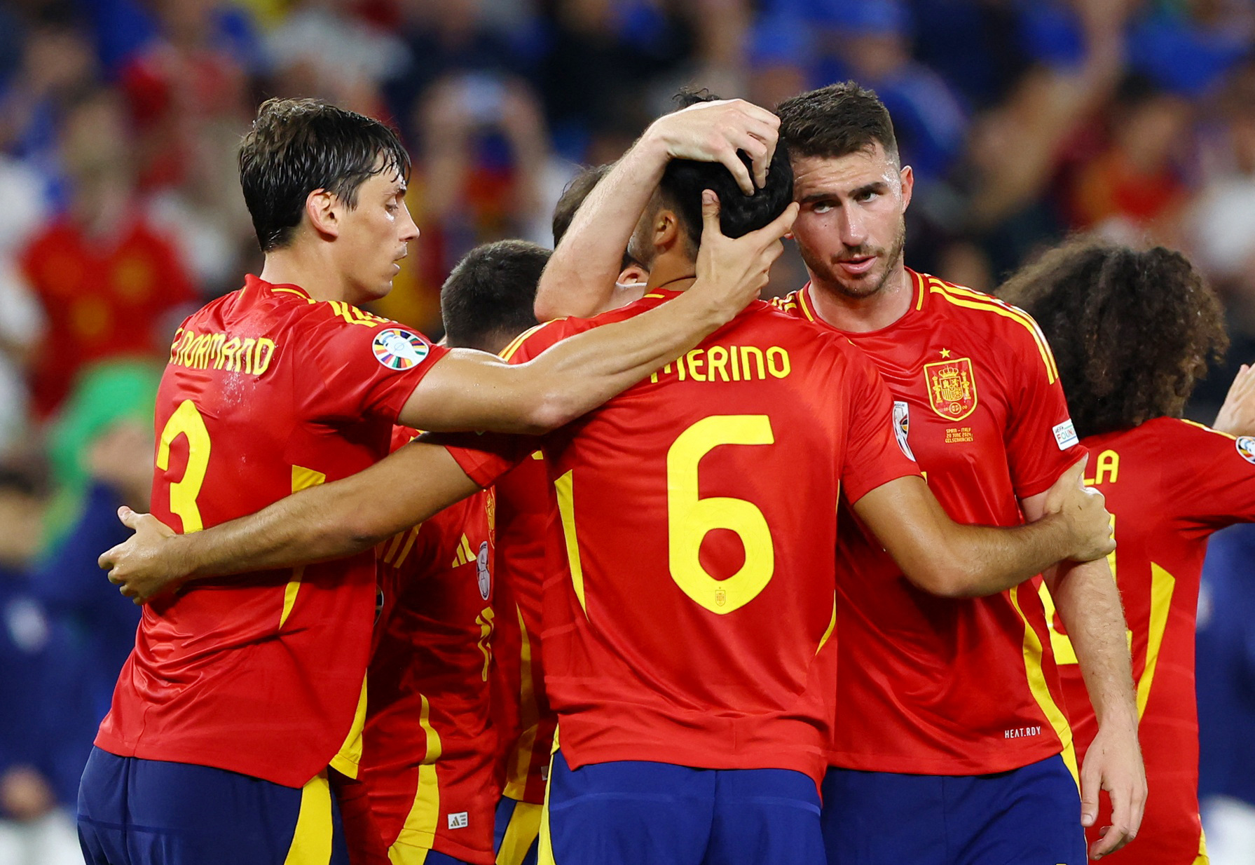 Soccer Football - Euro 2024 - Group B - Spain v Italy - Arena AufSchalke, Gelsenkirchen, Germany - June 20, 2024 Spain's Mikel Merino, Robin Le Normand and Aymeric Laporte celebrate after the match REUTERS