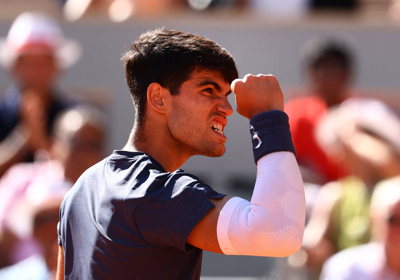 Tennis - French Open - Roland Garros, Paris, France - June 7, 2024 Spain's Carlos Alcaraz reacts during his semi final match against Italy's Jannik Sinner REUTERS