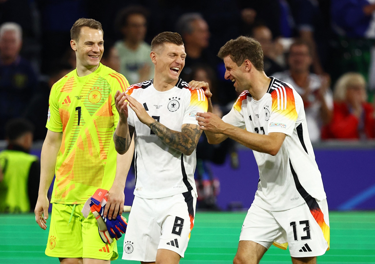 Soccer Football - Euro 2024 - Group A - Germany v Scotland - Munich Football Arena, Munich, Germany - June 14, 2024  Germany's Manuel Neuer, Toni Kroos and Thomas Muller celebrate after the match REUTERS