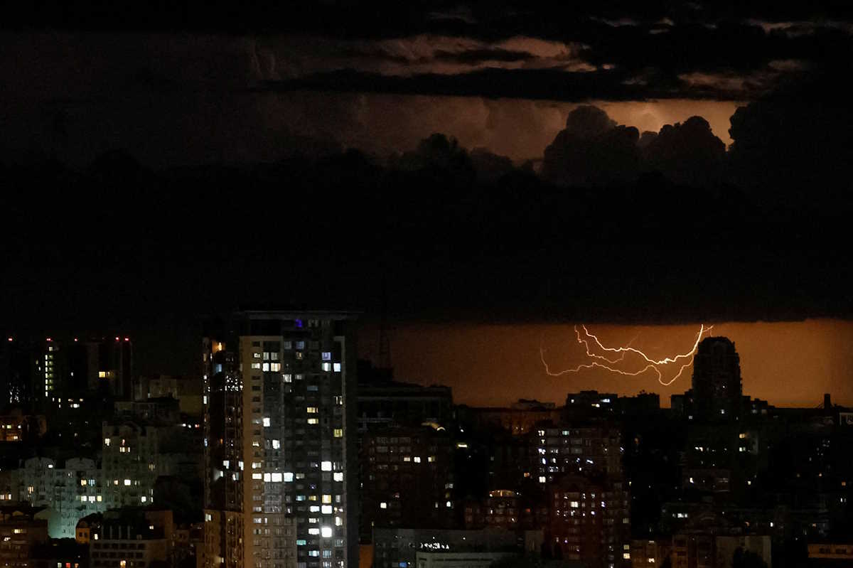 A flash from the lightning illuminates the sky over the city before a night storm in Kyiv, Ukraine June 4, 2024. REUTERS