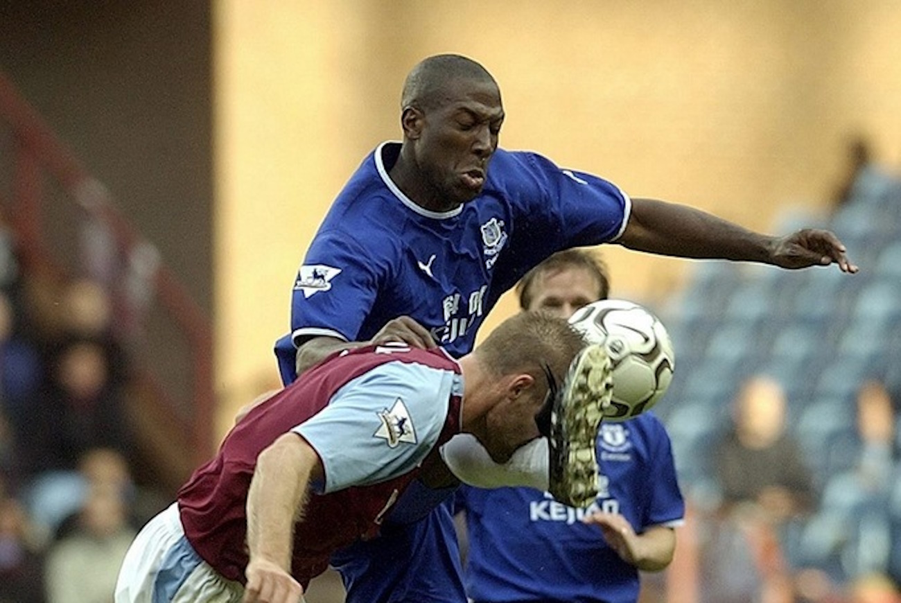 Aston Villa's Olof Mellberg (L) collides with Everton's Kevin Campbell during their Barclaycard Premiership soccer match at Villa Park, Birmingham, central England. Saturday 25 October 2003.  EPA