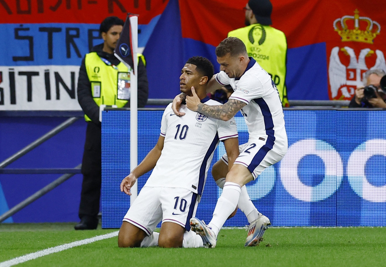 Soccer Football - Euro 2024 - Group C - Serbia v England - Arena AufSchalke, Gelsenkirchen, Germany - June 16, 2024 England's Jude Bellingham celebrates scoring their first goal with Kieran Trippier REUTERS