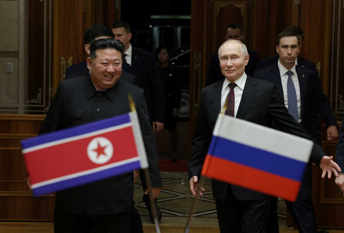 Russia's President Vladimir Putin is greeted by North Korea's leader Kim Jong Un during a meeting in Pyongyang, North Korea June 19, 2024. Sputnik