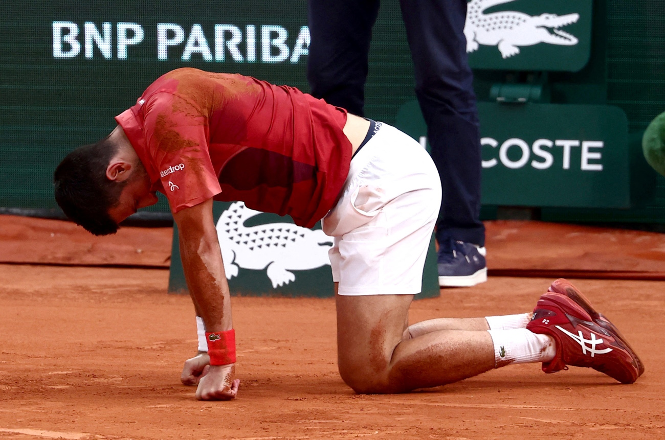 Tennis - French Open - Roland Garros, Paris, France - June 3, 2024 Serbia's Novak Djokovic reacts after falling during his fourth round match against Argentina's Francisco Cerundolo  REUTERS