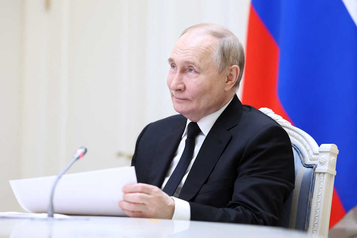 Russian President Vladimir Putin holds a meeting with large families from various Russia's regions via video link at the Kremlin in Moscow, Russia May 30, 2024. Sputnik