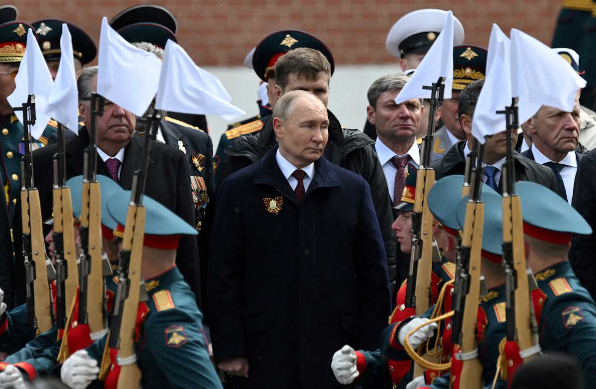 FILE PHOTO: Russian President Vladimir Putin watches honour guards passing by during a flower-laying ceremony at the Tomb of the Unknown Soldier on Victory Day, which marks the 79th anniversary of the victory over Nazi Germany in World War Two, in central Moscow, Russia, May 9, 2024. Sputnik