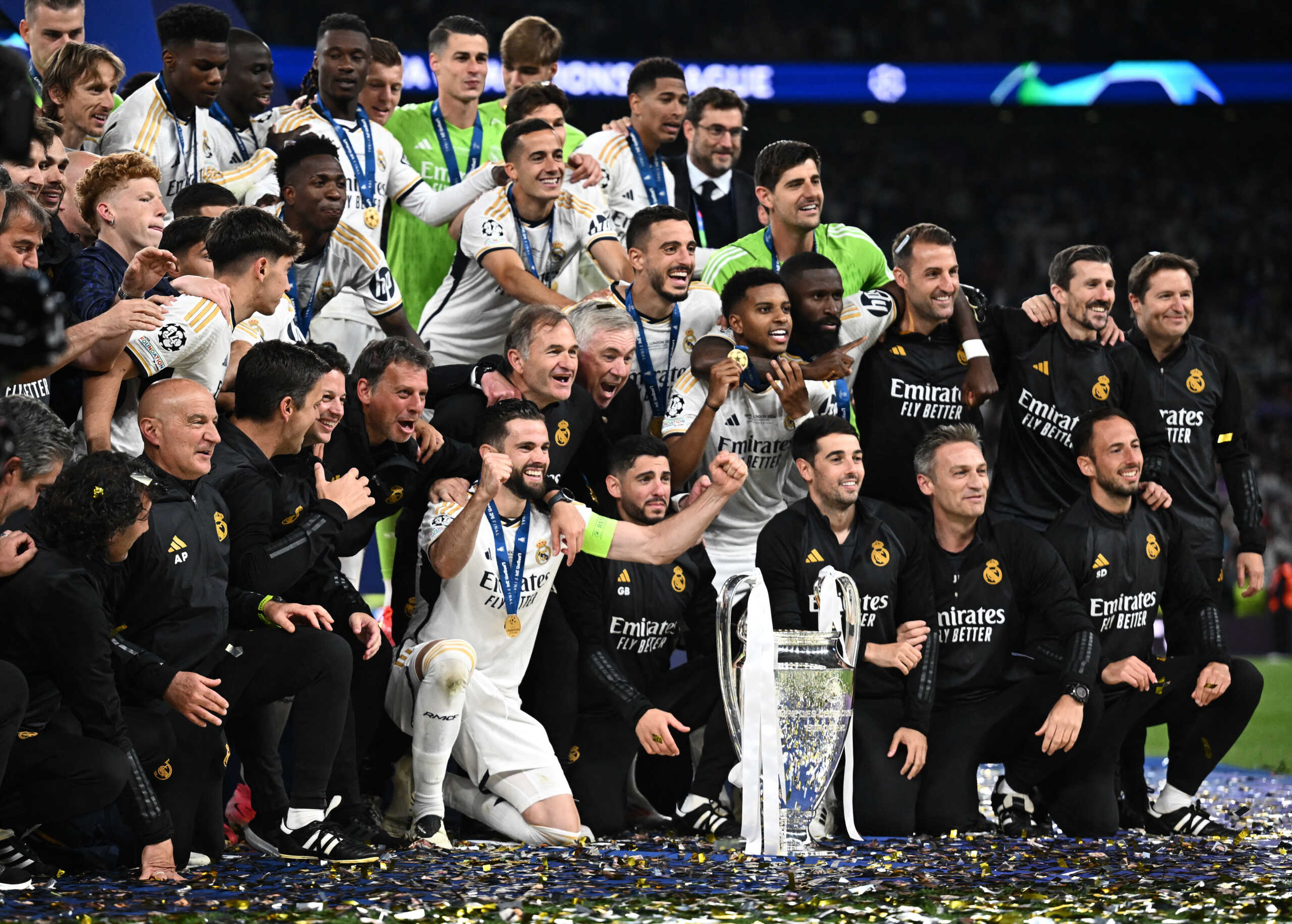 Soccer Football - Champions League - Final - Borussia Dortmund v Real Madrid - Wembley Stadium, London, Britain - June 1, 2024 Real Madrid players celebrate with the trophy after winning the Champions League REUTERS