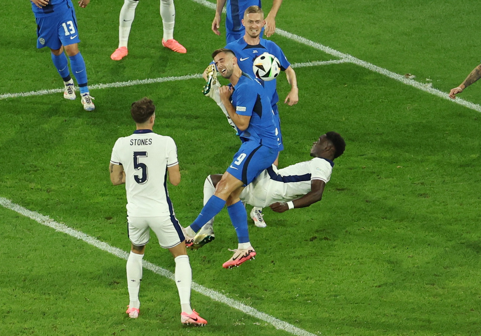 Soccer Football - Euro 2024 - Group C - England v Slovenia - Cologne Stadium, Cologne, Germany - June 25, 2024  England's Bukayo Saka shoots at goal as Slovenia's Andraz Sporar attempts to block REUTERS