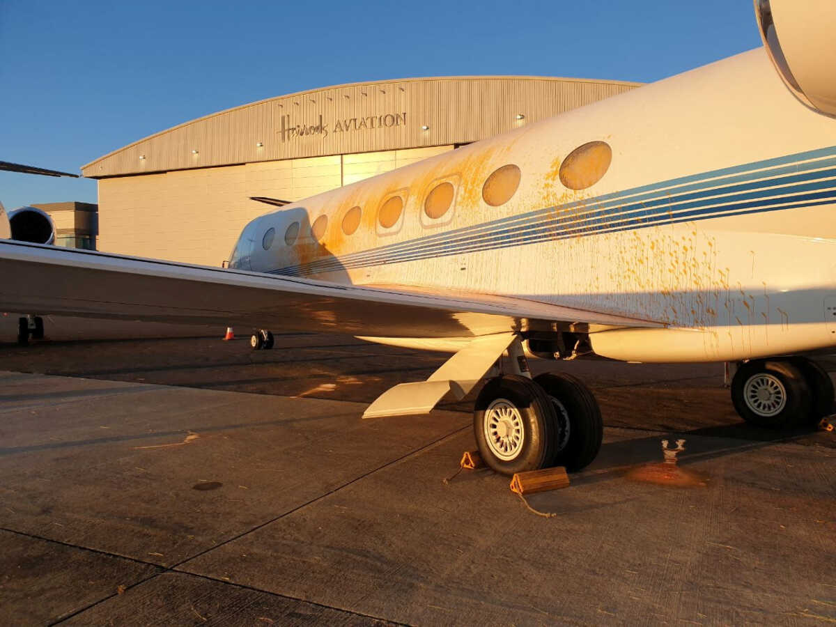 A view of an aircraft as members of the Just Stop Oil spray paints planes at the Stansted airport, Britain June 20, 2024.    JUST STOP OIL