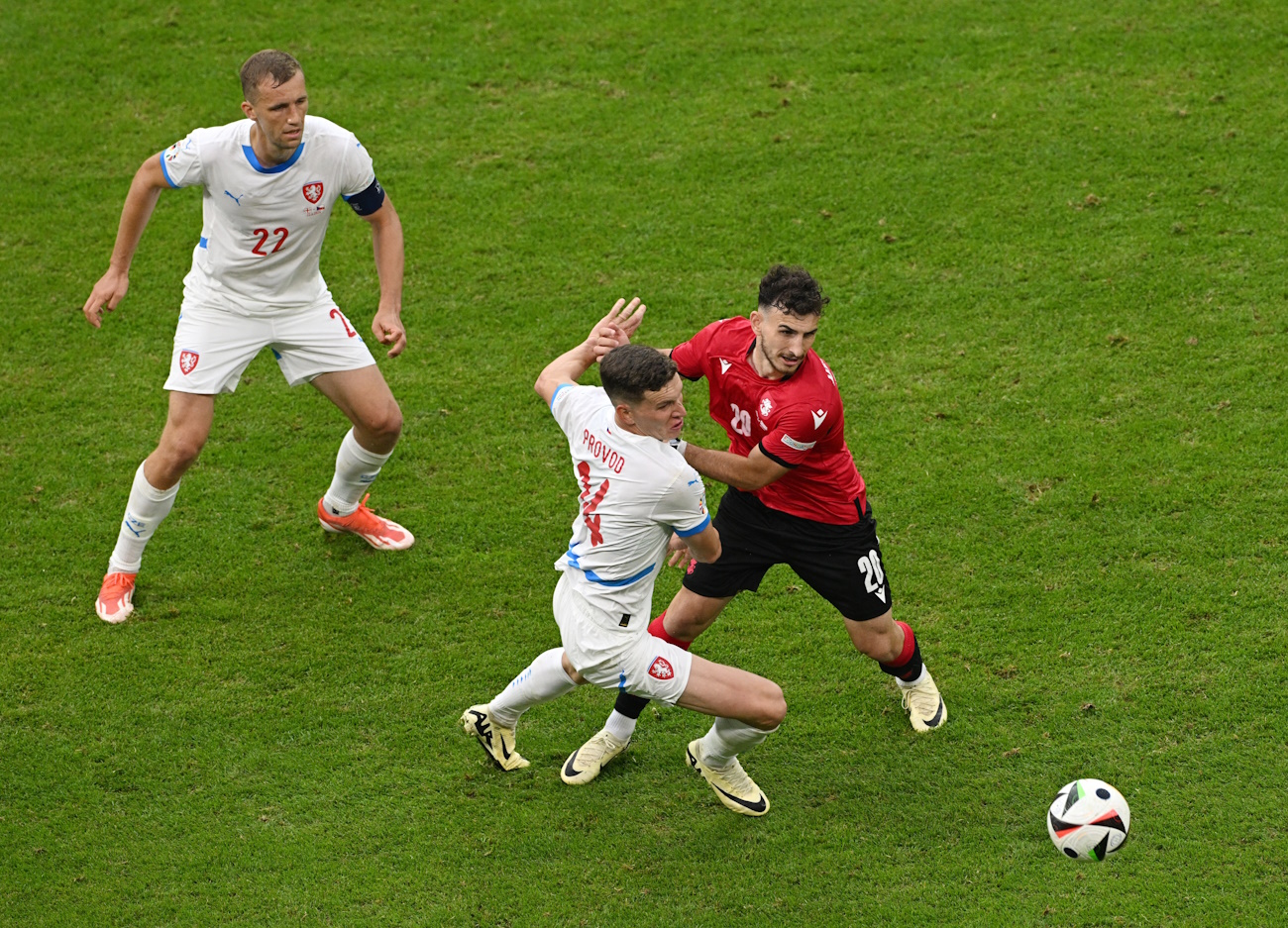 Soccer Football - Euro 2024 - Group F - Georgia v Czech Republic - Hamburg Volksparkstadion, Hamburg, Germany - June 22, 2024 Georgia's Anzor Mekvabishvili in action with Czech Republic's Lukas Provod REUTERS