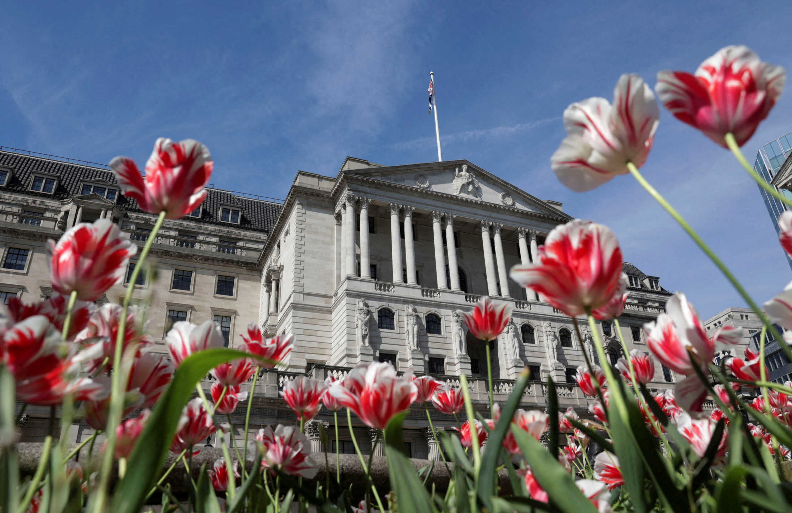 FILE PHOTO: The Bank of England building is seen surrounded by flowers in London, Britain, May 8, 2024. REUTERS