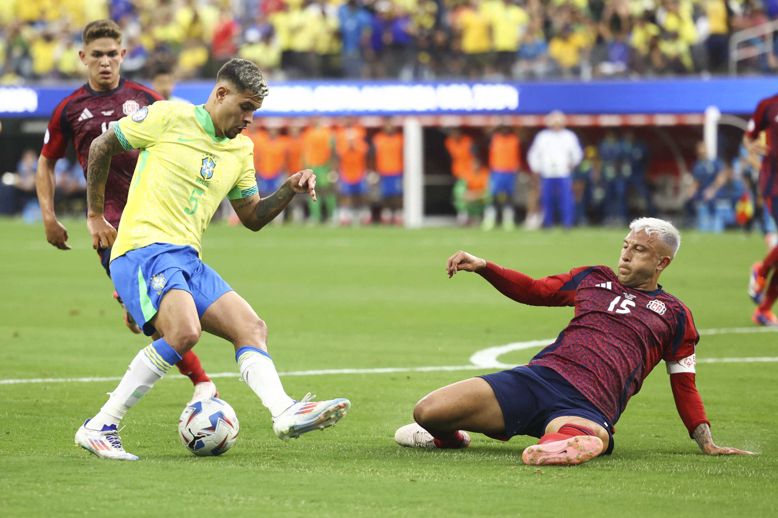 Jun 24, 2024; Inglewood, CA, USA; Brazil midfielder Bruno Guimarães (5) dribbles against Costa Rica during the first half of a match at SoFi Stadium. Mandatory Credit: Jessica Alcheh-USA TODAY Sports
