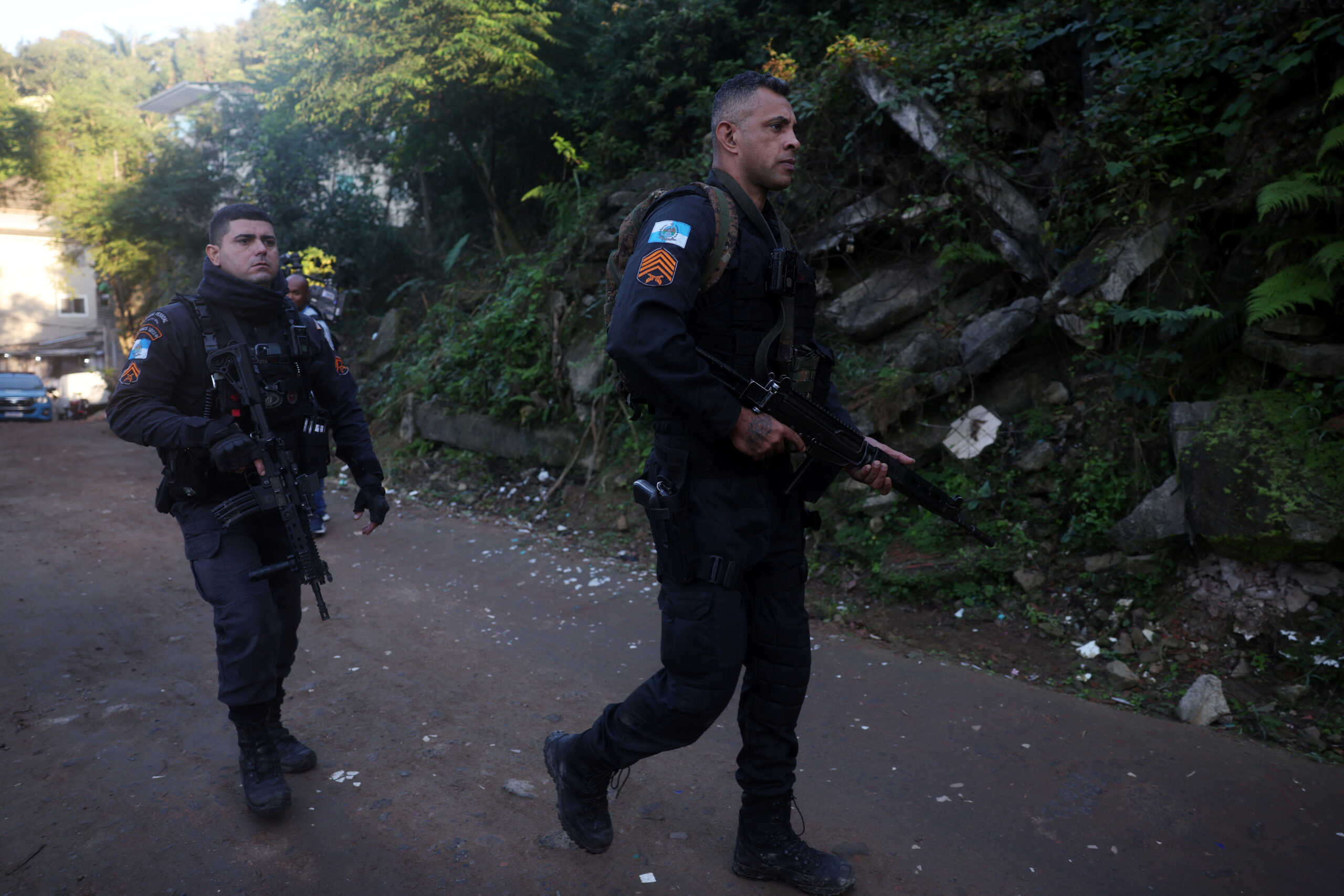 Police officers patrol during the Secretaria de Ordem Publica SEOP (Public Order Secretariat) operation against militia in Muzema slum in Rio de Janeiro, Brazil June 13, 2024. REUTERS