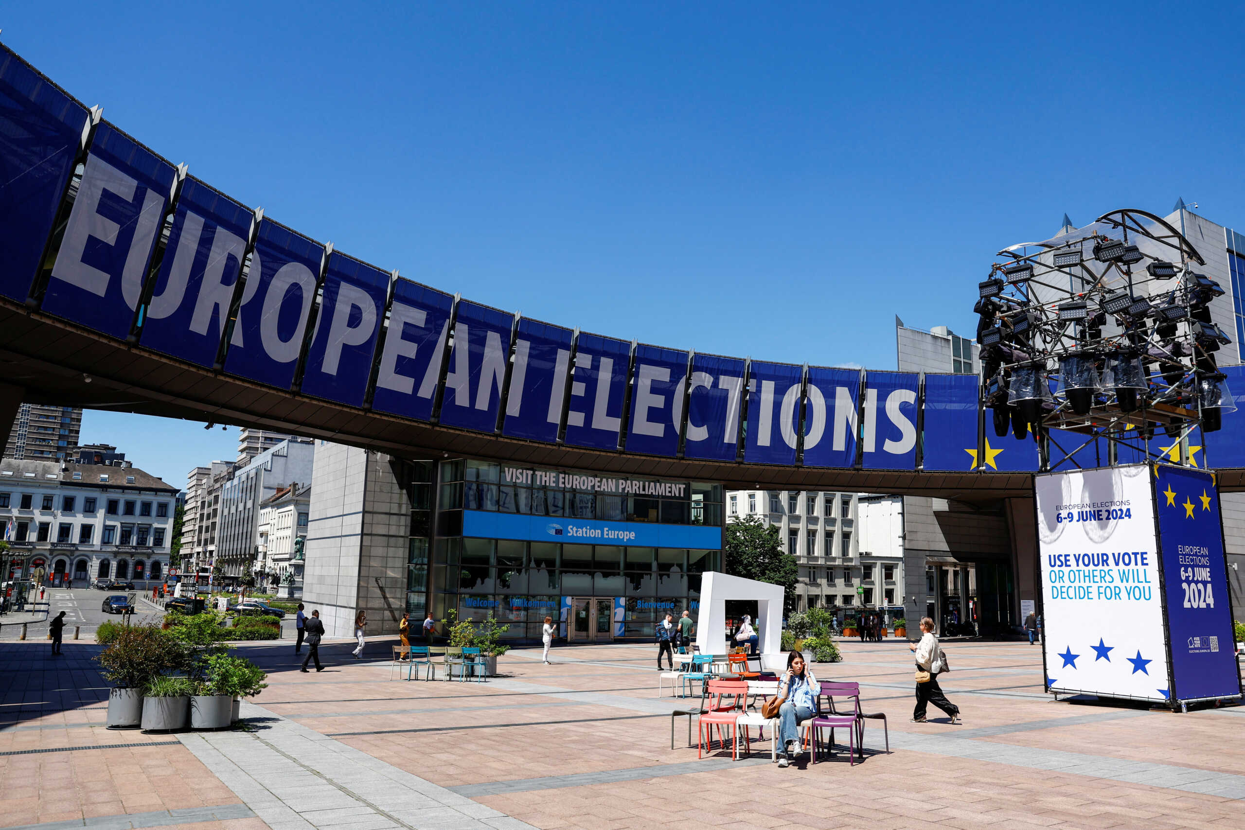 People walk near the European Parliament, on the day of the European Parliament elections in Brussels, Belgium, June 9, 2024. REUTERS