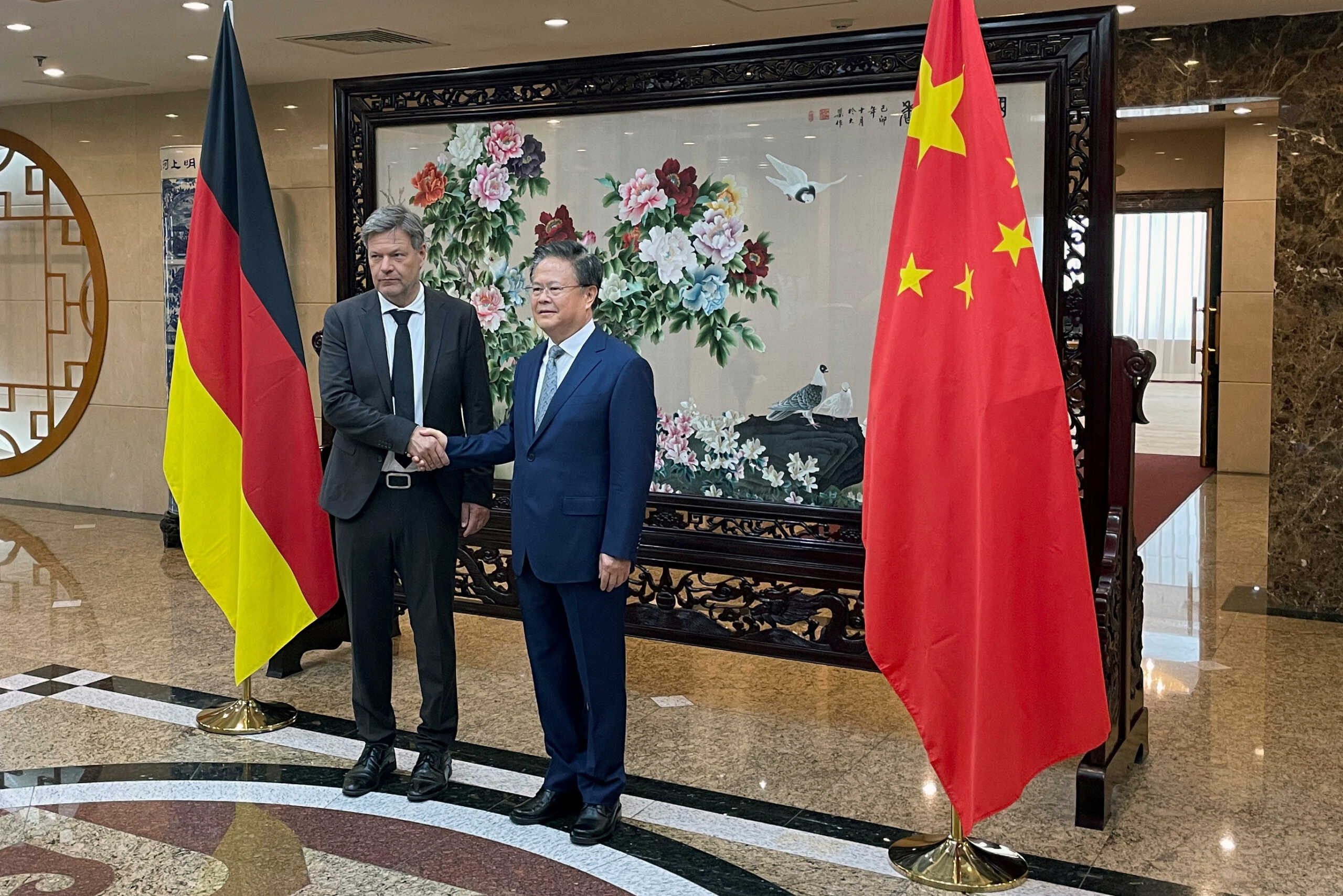German Vice Chancellor and Economy Minister Robert Habeck shakes hands with National Development and Reform Commission (NDRC) Chairman Zheng Shanjie before a meeting in Beijing, China June 22, 2024. REUTERS
