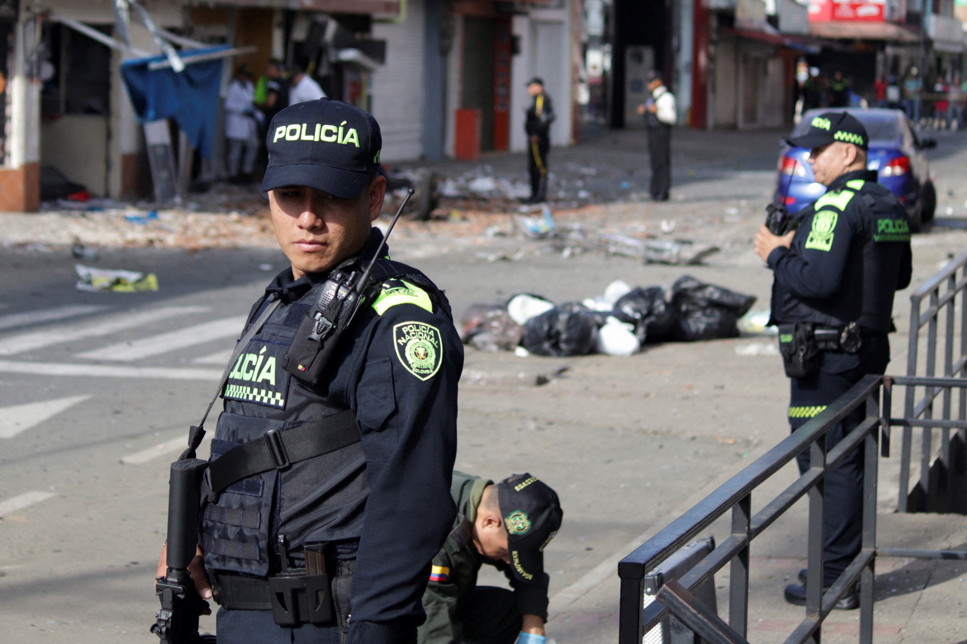 Police inspect the area where a motorcycle bomb exploded in front of a residence of members of the Police in Jamundi, Colombia May 20, 2024. REUTERS