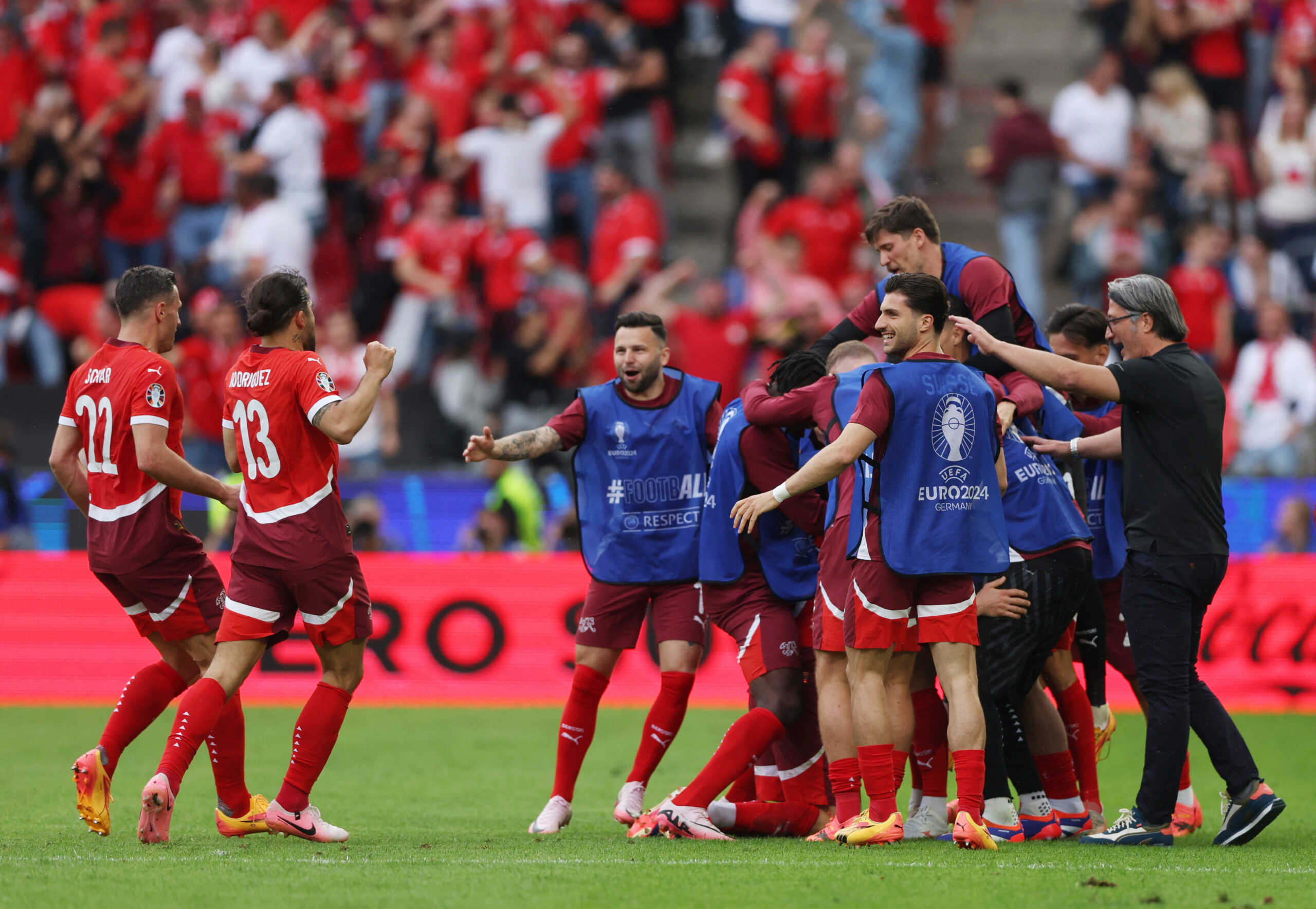 Soccer Football - Euro 2024 - Group A - Hungary v Switzerland - Cologne Stadium, Cologne, Germany - June 15, 2024 Switzerland's Michel Aebischer celebrates scoring their second goal with teammates and coach Murat Yakin REUTERS