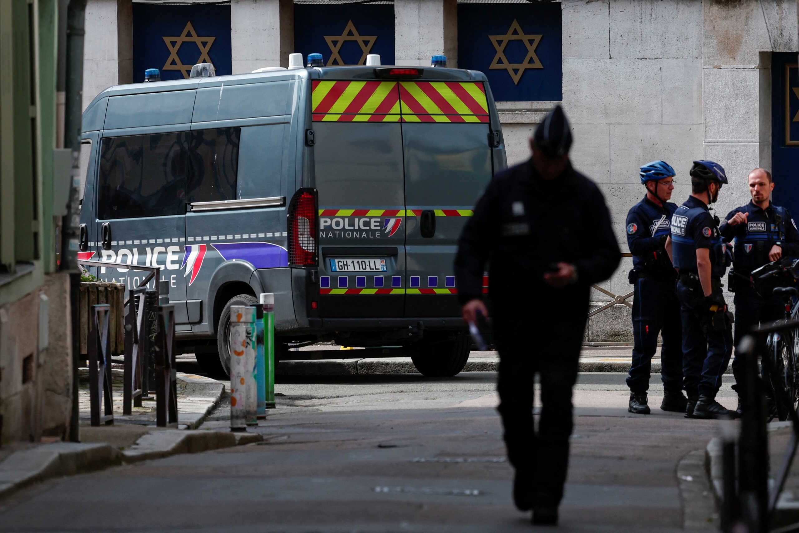 Police officers work after police shot dead an armed man earlier who set fire to the city's synagogue in Rouen, France, May 17, 2024. REUTERS