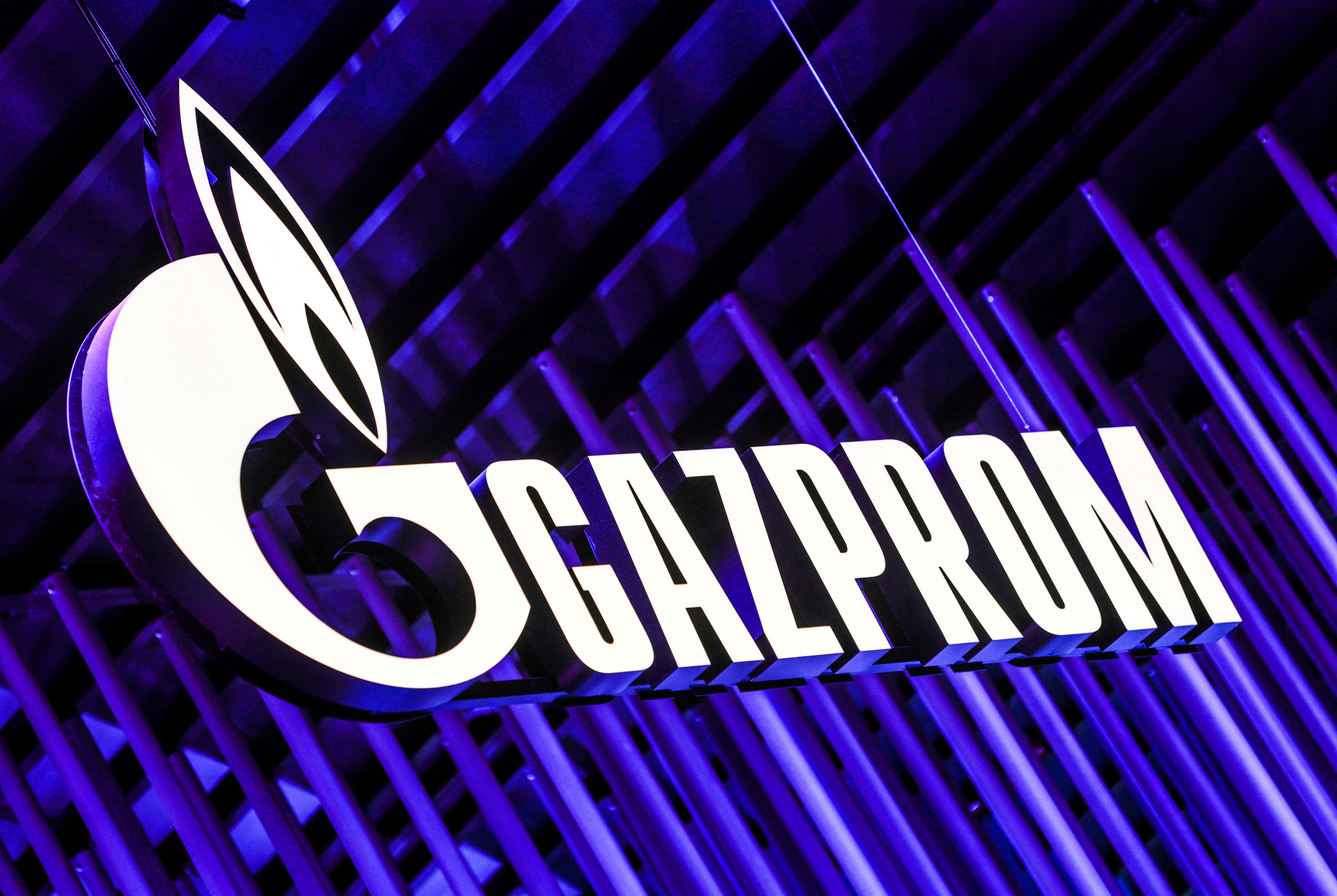 FILE PHOTO: The logo of Gazprom company is seen at the St. Petersburg International Economic Forum (SPIEF) in Saint Petersburg, Russia June 15, 2022. REUTERS