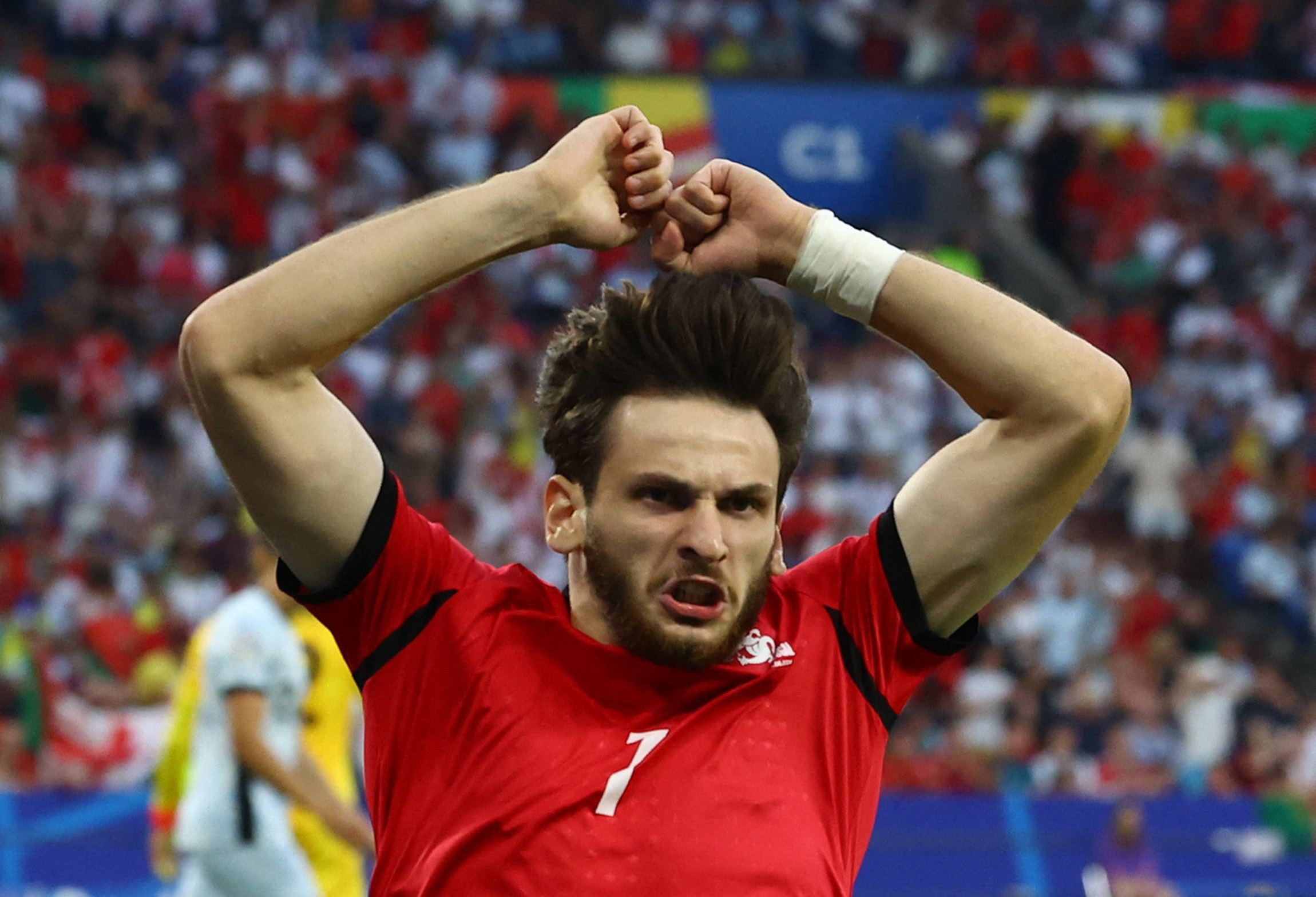 Soccer Football - Euro 2024 - Group F - Georgia v Portugal - Arena AufSchalke, Gelsenkirchen, Germany - June 26, 2024  Georgia's Khvicha Kvaratskhelia celebrates scoring their first goal REUTERS