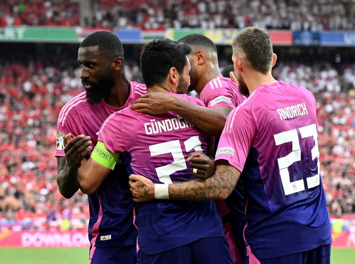 FILE PHOTO: Soccer Football - Euro 2024 - Group A - Germany v Hungary - Stuttgart Arena, Stuttgart, Germany - June 19, 2024 Germany's Ilkay Gundogan celebrates scoring their second goal with teammates REUTERS