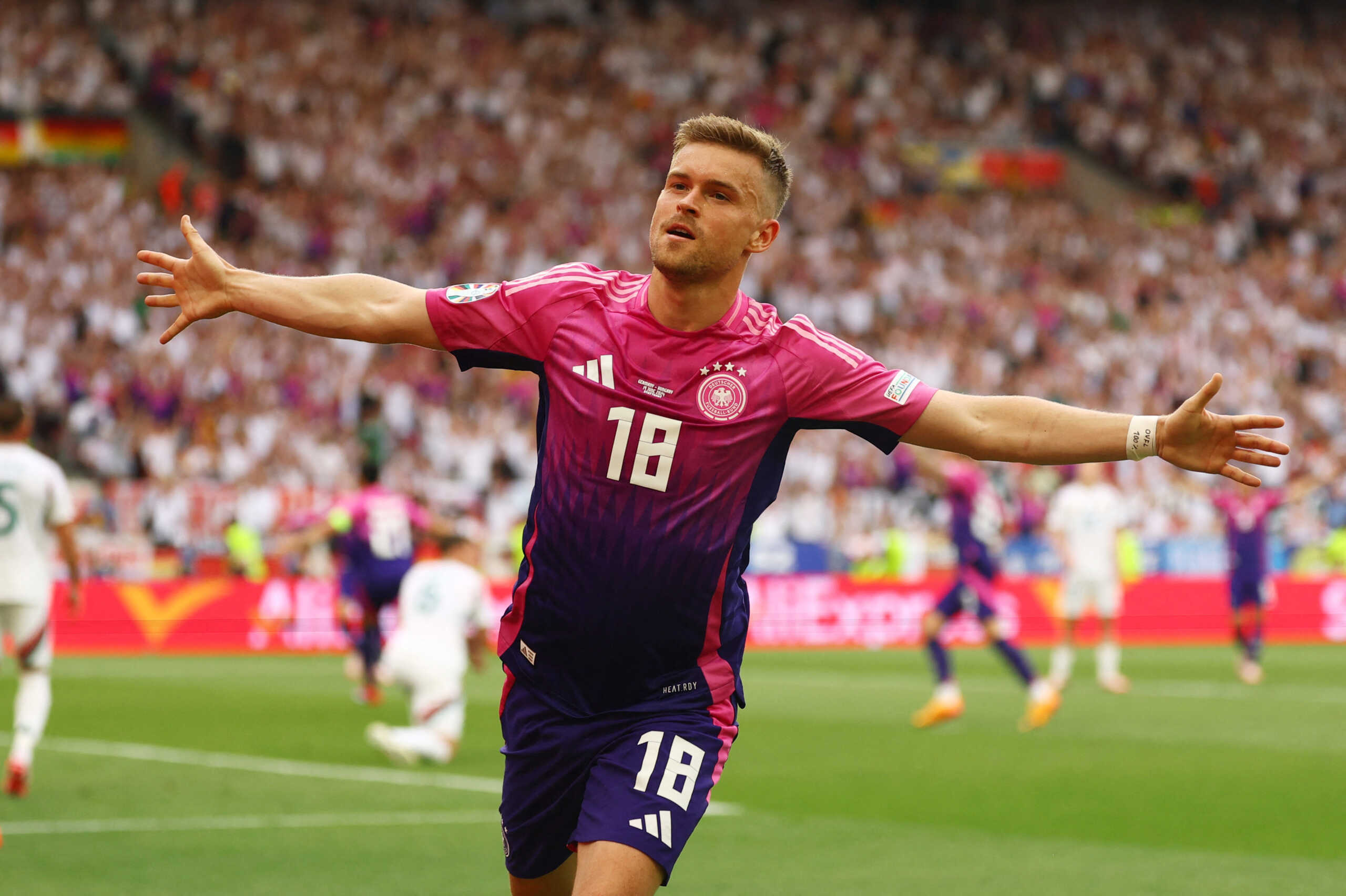 Soccer Football - Euro 2024 - Group A - Germany v Hungary - Stuttgart Arena, Stuttgart, Germany - June 19, 2024 Germany's Maximilian Mittelstadt celebrates their second goal scored by Ilkay Gundogan REUTERS