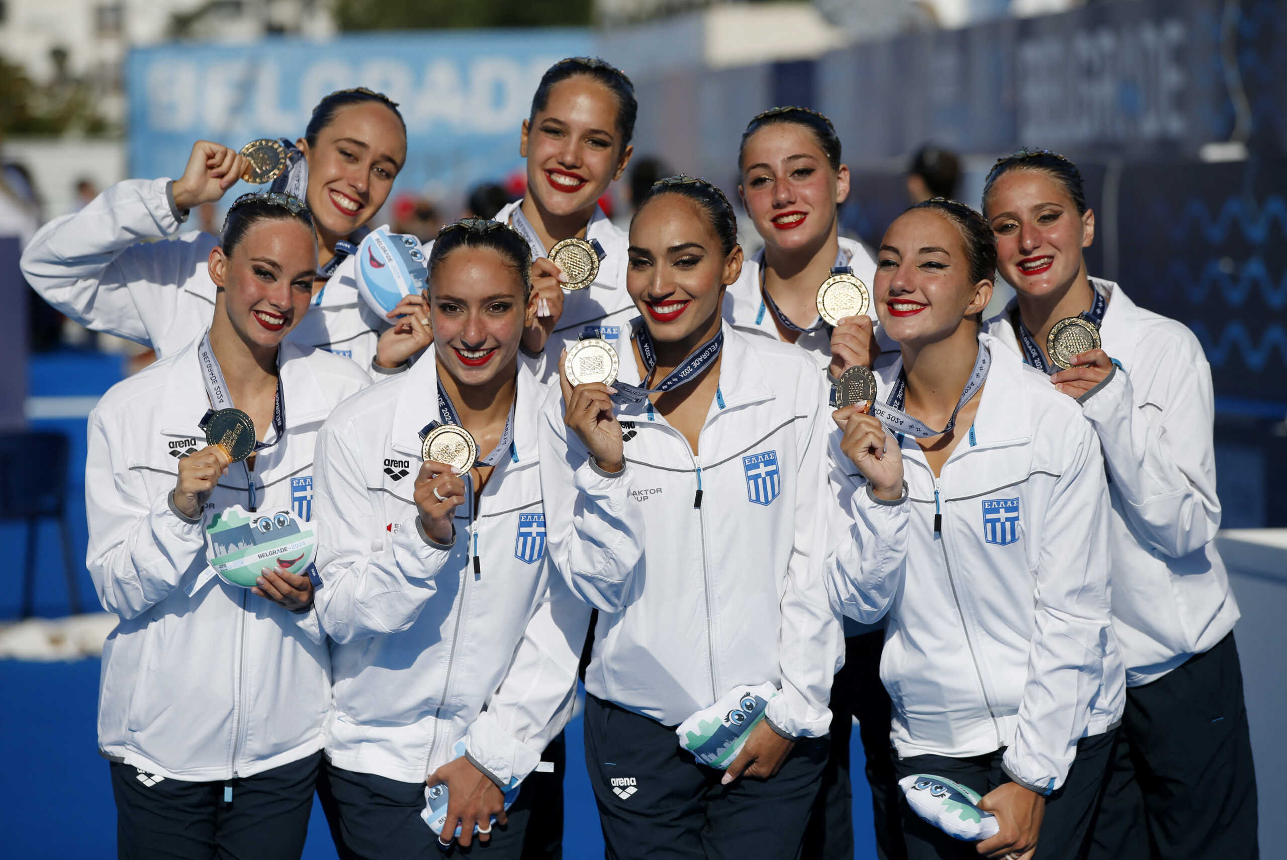 Artistic Swimming - European Aquatics Championships - Sports and Recreational Center Milan Gale Muskatirovic, Belgrade, Serbia - June 14, 2024 Gold medallists Team Greece celebrate on the podium with medals after winning the the team free final REUTERS