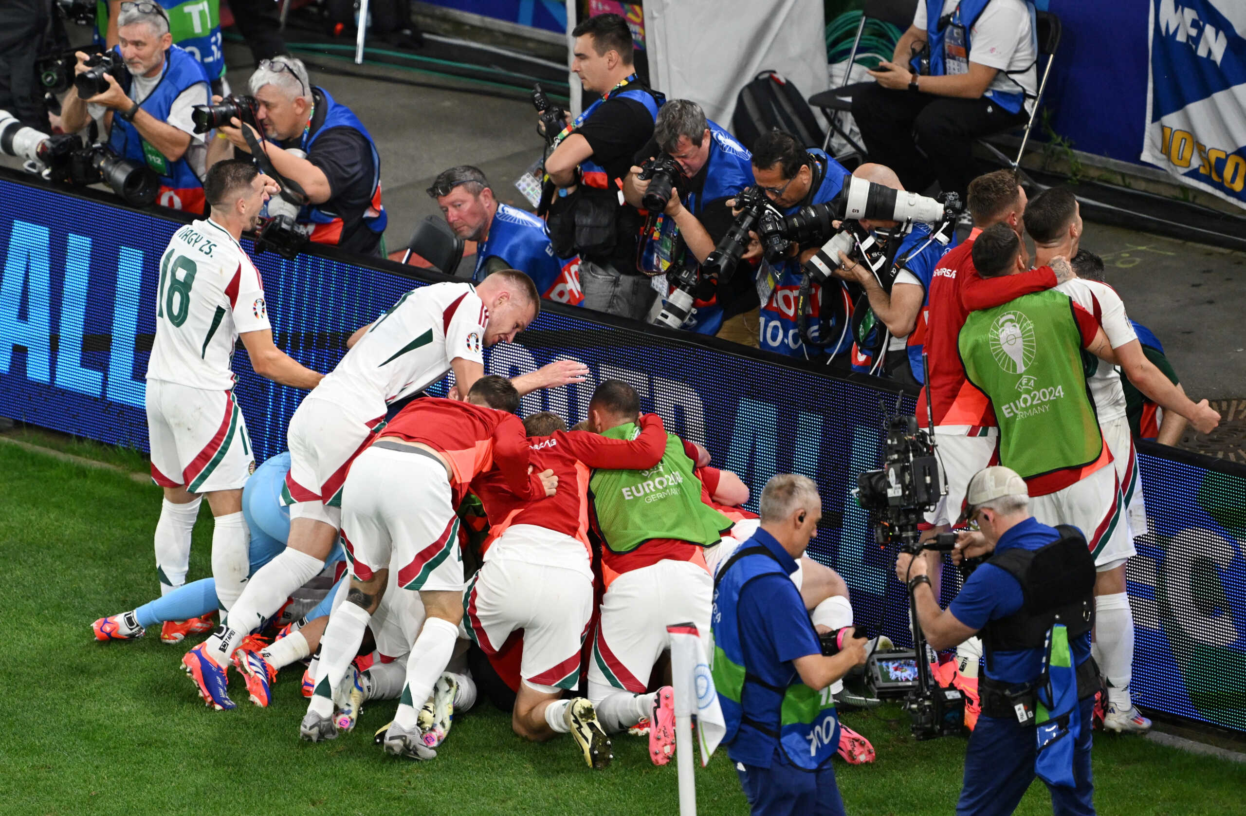 Soccer Football - Euro 2024 - Group A - Scotland v Hungary - Stuttgart Arena, Stuttgart, Germany - June 23, 2024 Hungary's Kevin Csoboth celebrates scoring their first goal with teammates REUTERS
