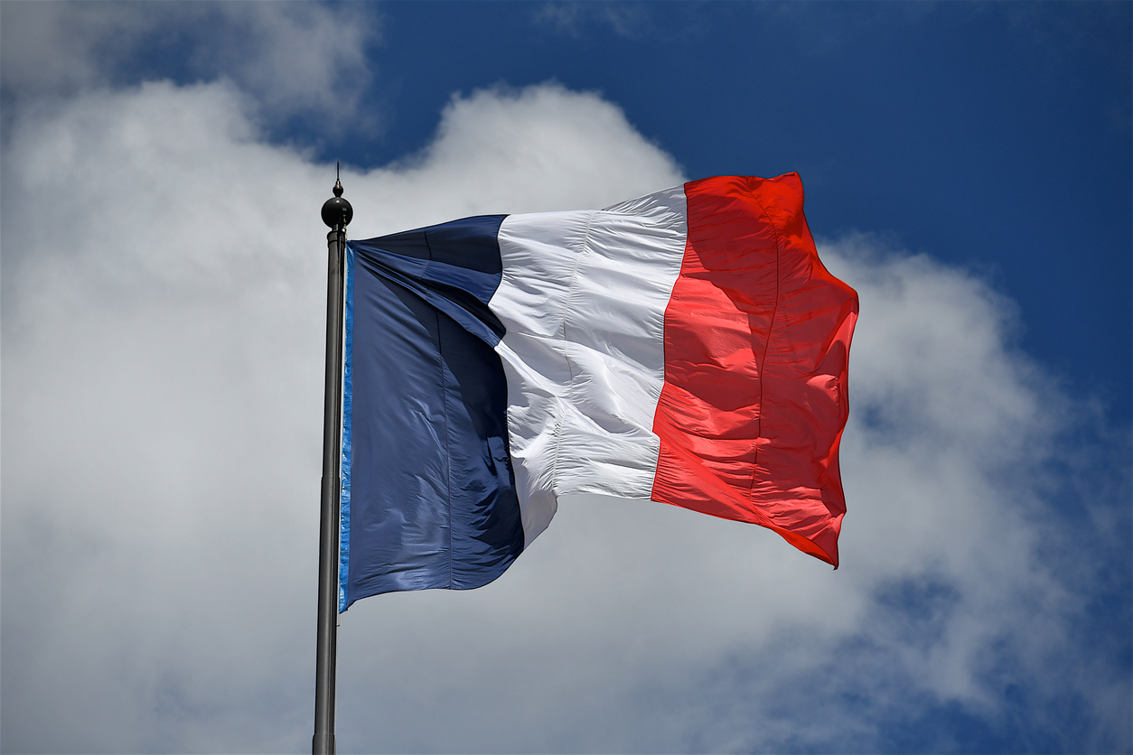 Paris, France-05 07 2021:French flag floating in the wind, Paris, France.