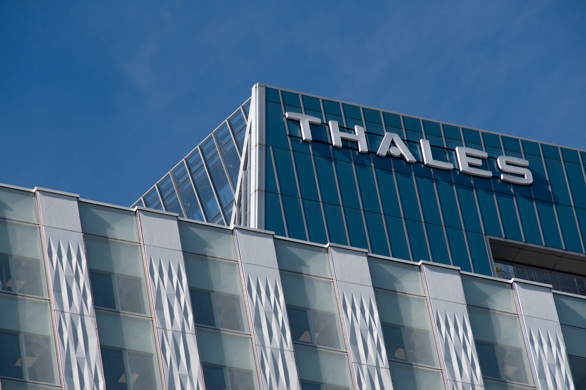 Courbevoie, France - March 14, 2022: View of the top of the tower housing the headquarters of the French electronics group Thales, located in the Paris-La Defense business district