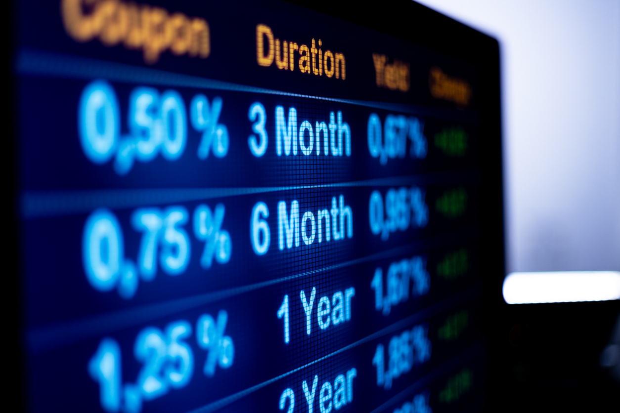 Close up computer monitor with rising yields and rates. financial business, mortgage rates, debt financing and banking industry.