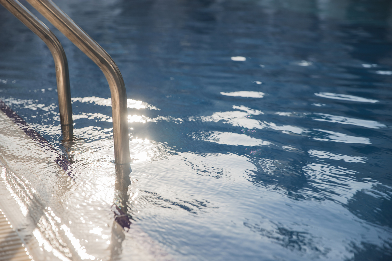 Swimming pool stairs going directly into the water