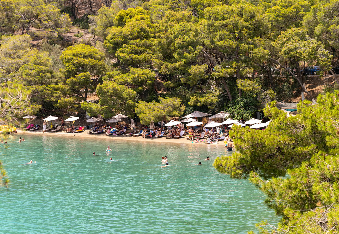 Love bay beach with local people and tourists enjoying summer.
