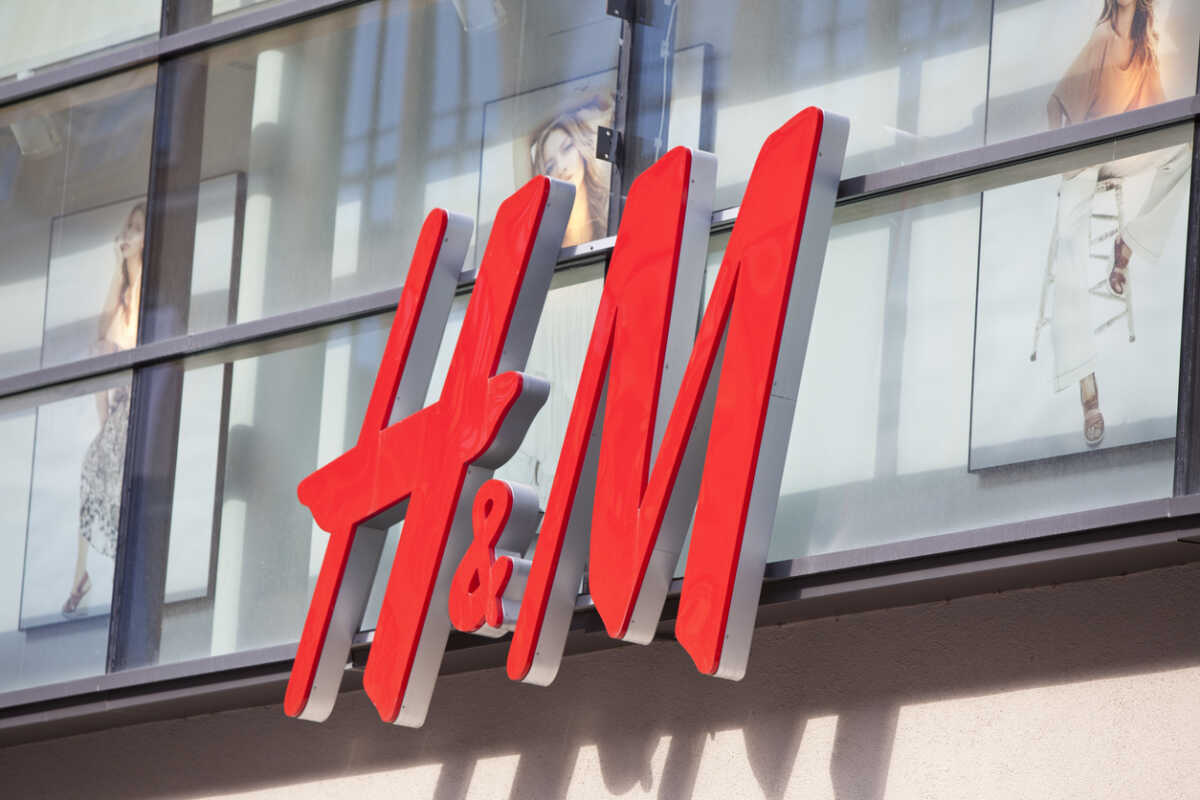 Munich, Germany - April 3, 2011: Logo of the Swedish retail-clothing company Hennes & Mauritz (H&M) on a store in the center of Munich (pedestrian area Kaufinger Street).
